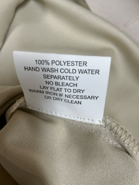 Fabric care label for Rabbit Rabbit Rabbit Beige Dress, 100% polyester, hand wash cold, lay flat to dry, size 6, sustainable fashion option.