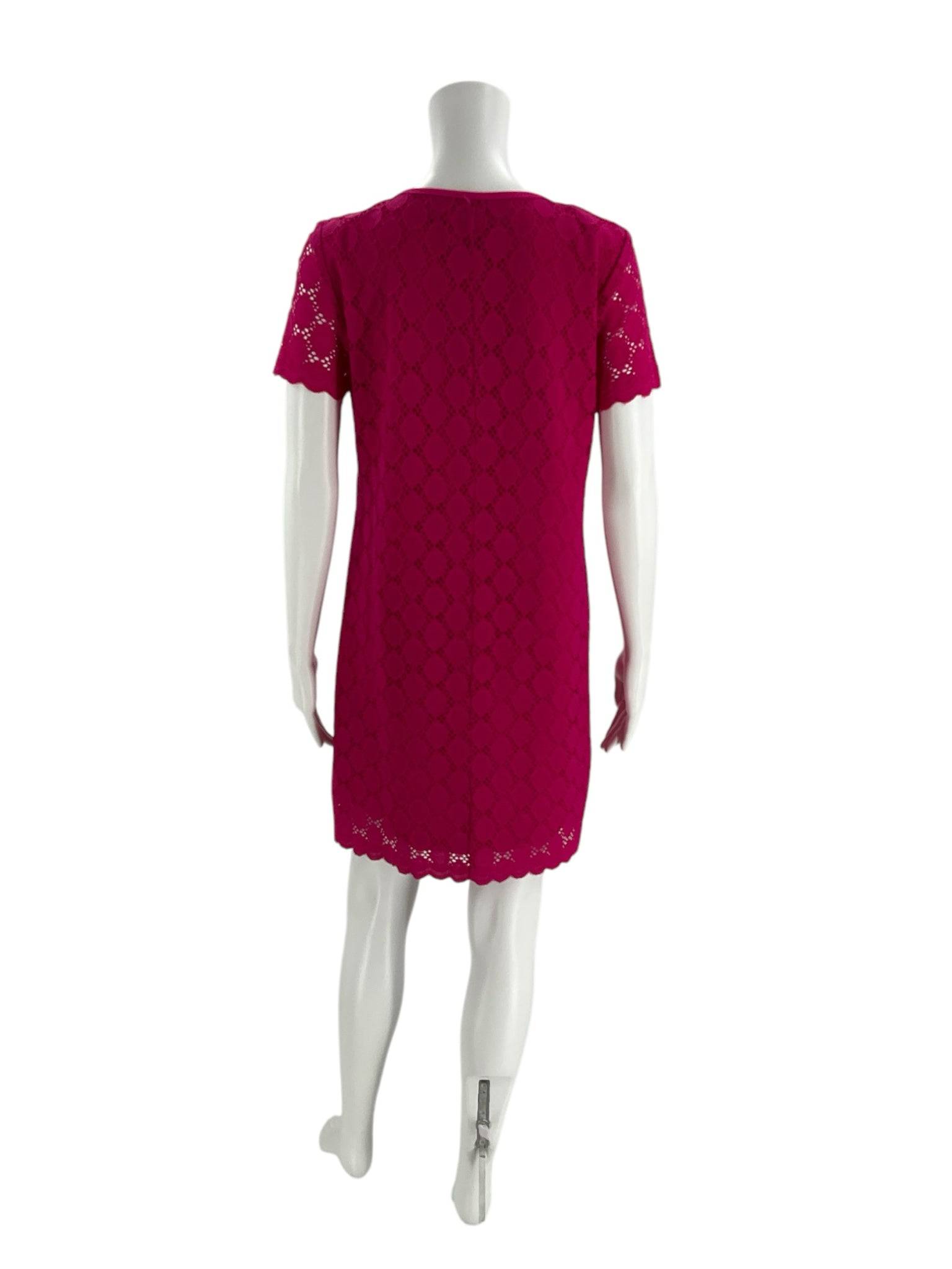 Back view of Ronnie Nicole 2 Piece Ensemble Size Petite Medium in hot pink on mannequin, highlighting intricate lace pattern and tailored silhouette.