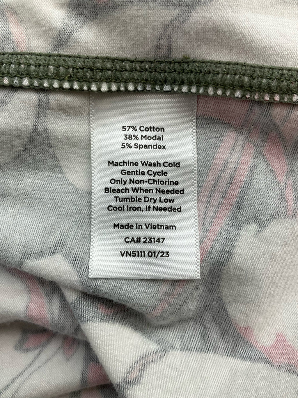 T by Talbots casual knit tee in olive, pink, and white floral print, crew neck, short sleeve, size small petite.