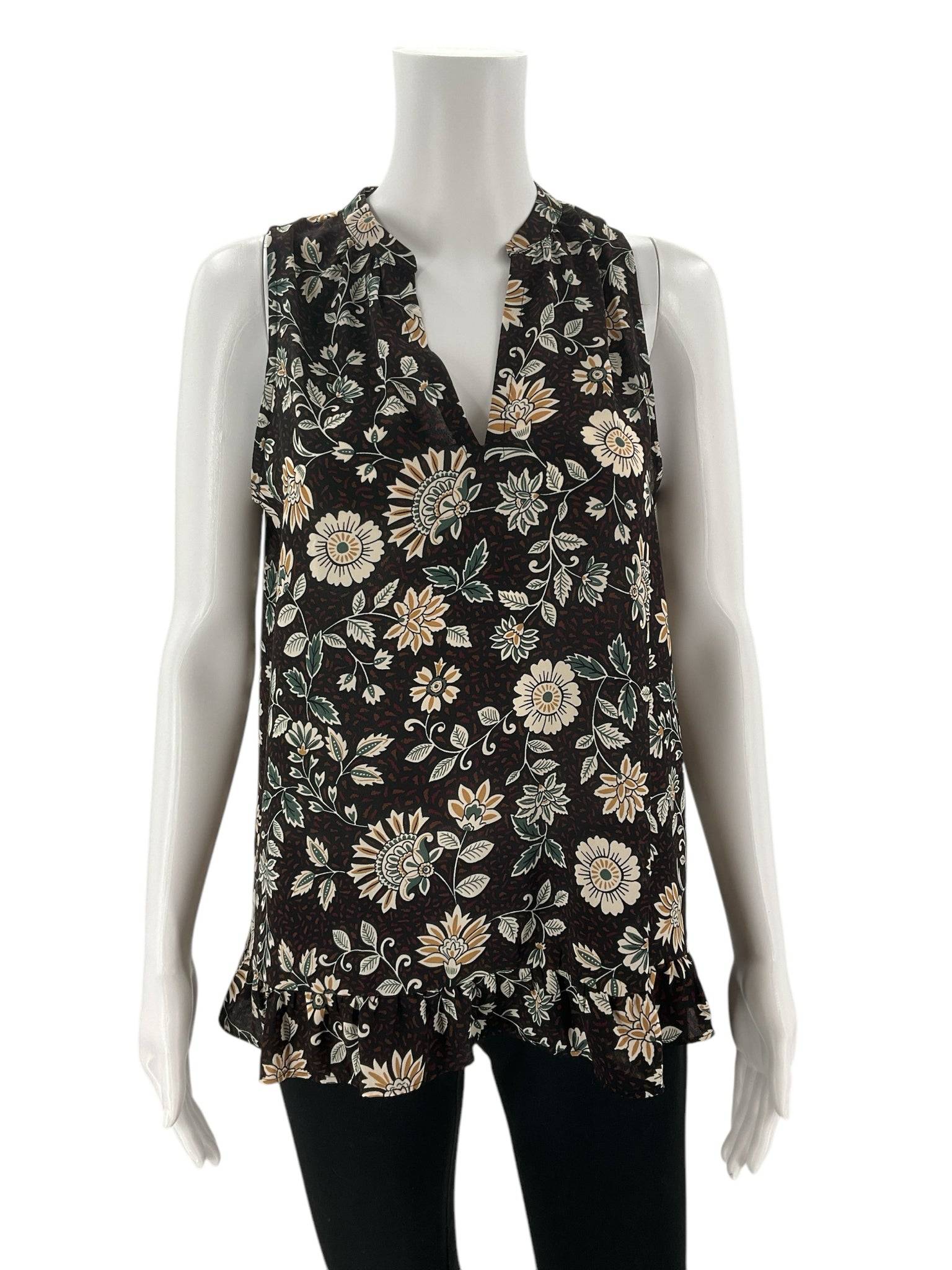 Front view of Loft Top Size Small | Margaret’s Fine Consignments featuring a sleeveless black and green floral print with ruffled hem, ideal for casual outfits.