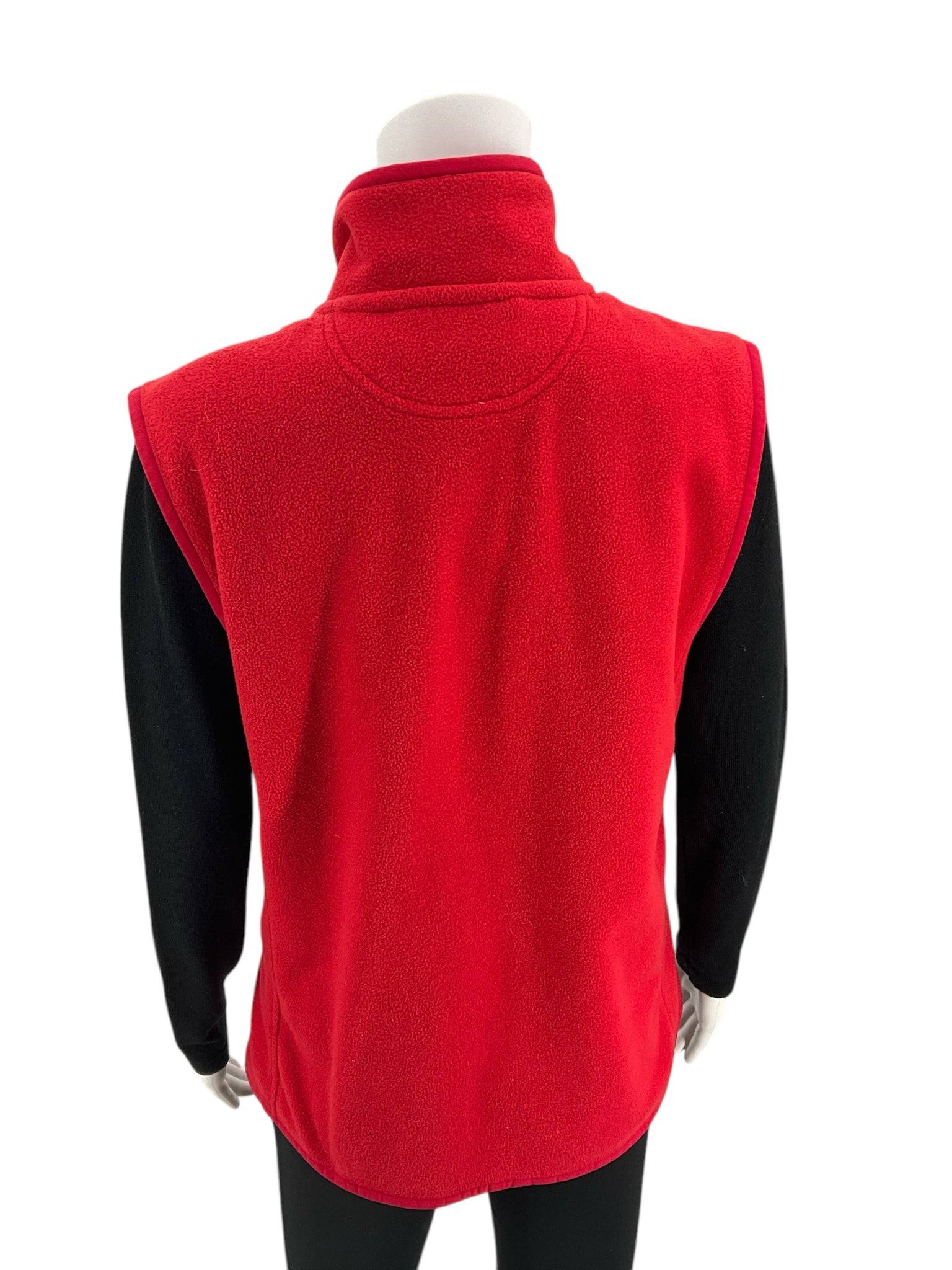 Back view of Polo Red Fleece Vest Size Medium with high collar and clean seams. Find this cozy vest at Margaret’s Fine Consignments.