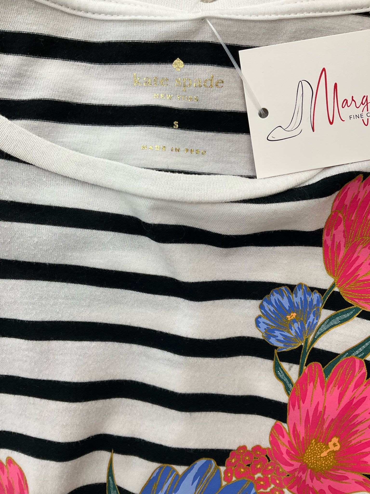 Kate Spade white and multi floral stripe short sleeve graphic tee for women, size small, laid flat on a surface.