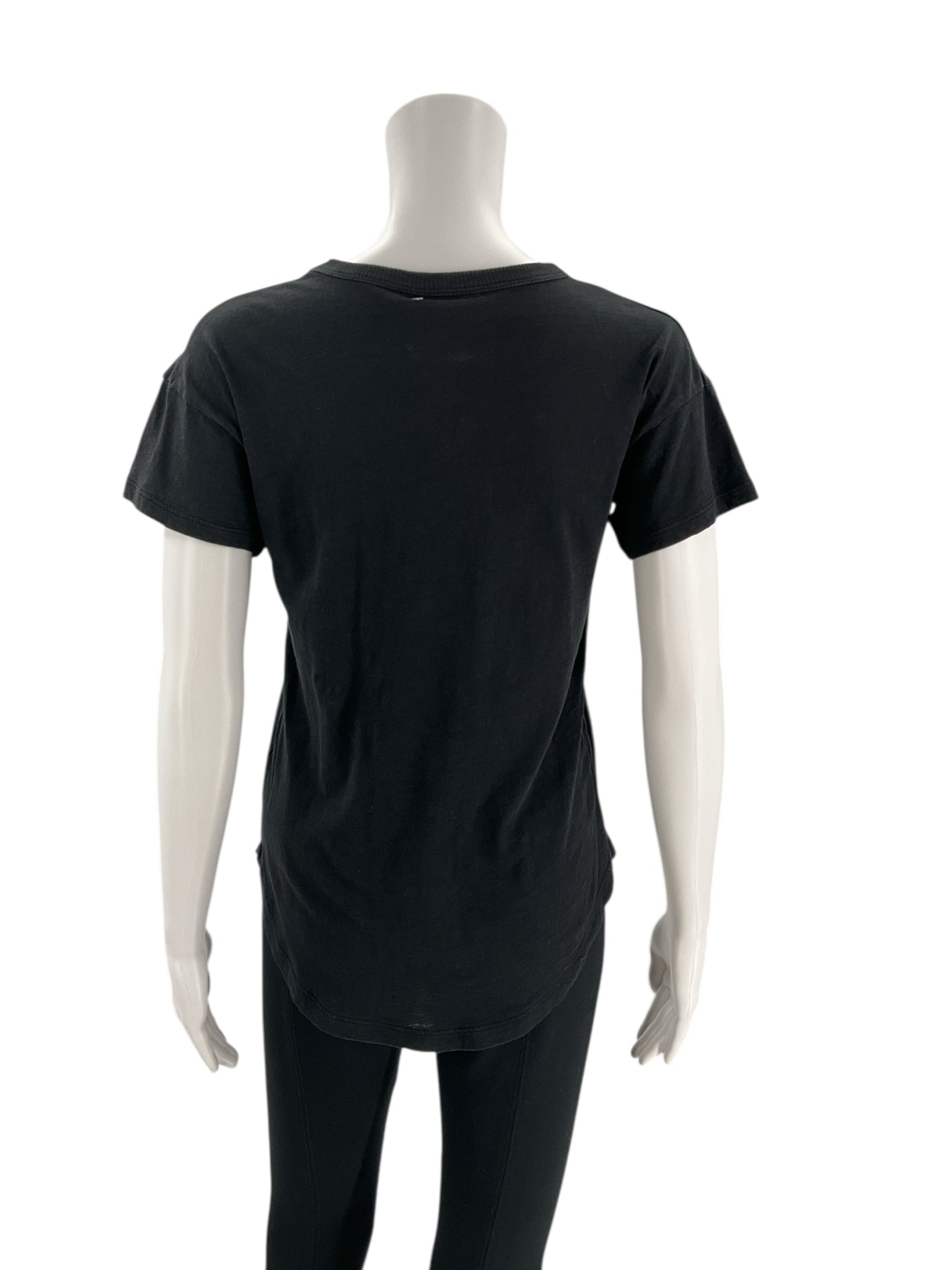 Back view of Madewell black pre-owned blouse, size XS, showcasing its minimalist design and curved hemline.