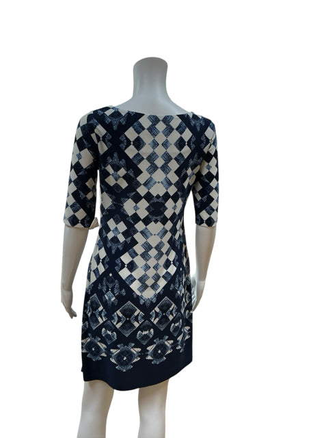 Back view of Eliza J geometric print shift dress in navy and ivory, size 2. Showcases the seamless pattern and flattering sheath silhouette.