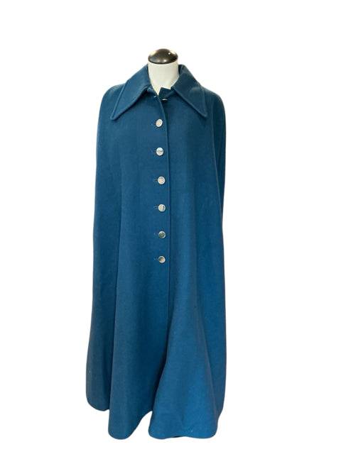 Gil Bret Cape Size 2X/3X in teal with front button closure, available at Margaret’s Fine Consignments. Elegant wool-blend outerwear for plus sizes.