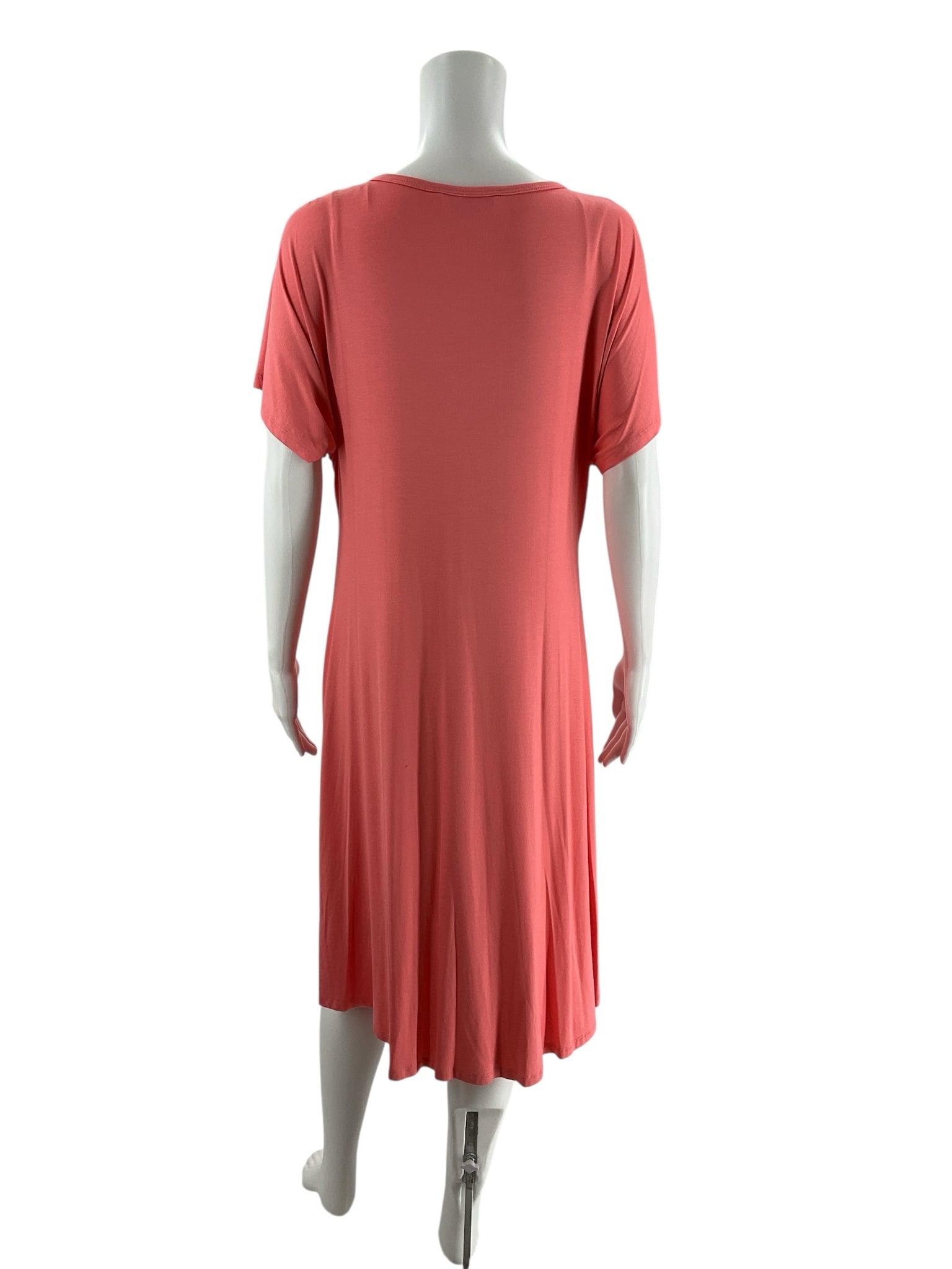 Back view of Trina Turk Tahiti coral midi dress in size L, showing relaxed fit and flowy stretch jersey fabric. Sustainable summer fashion.