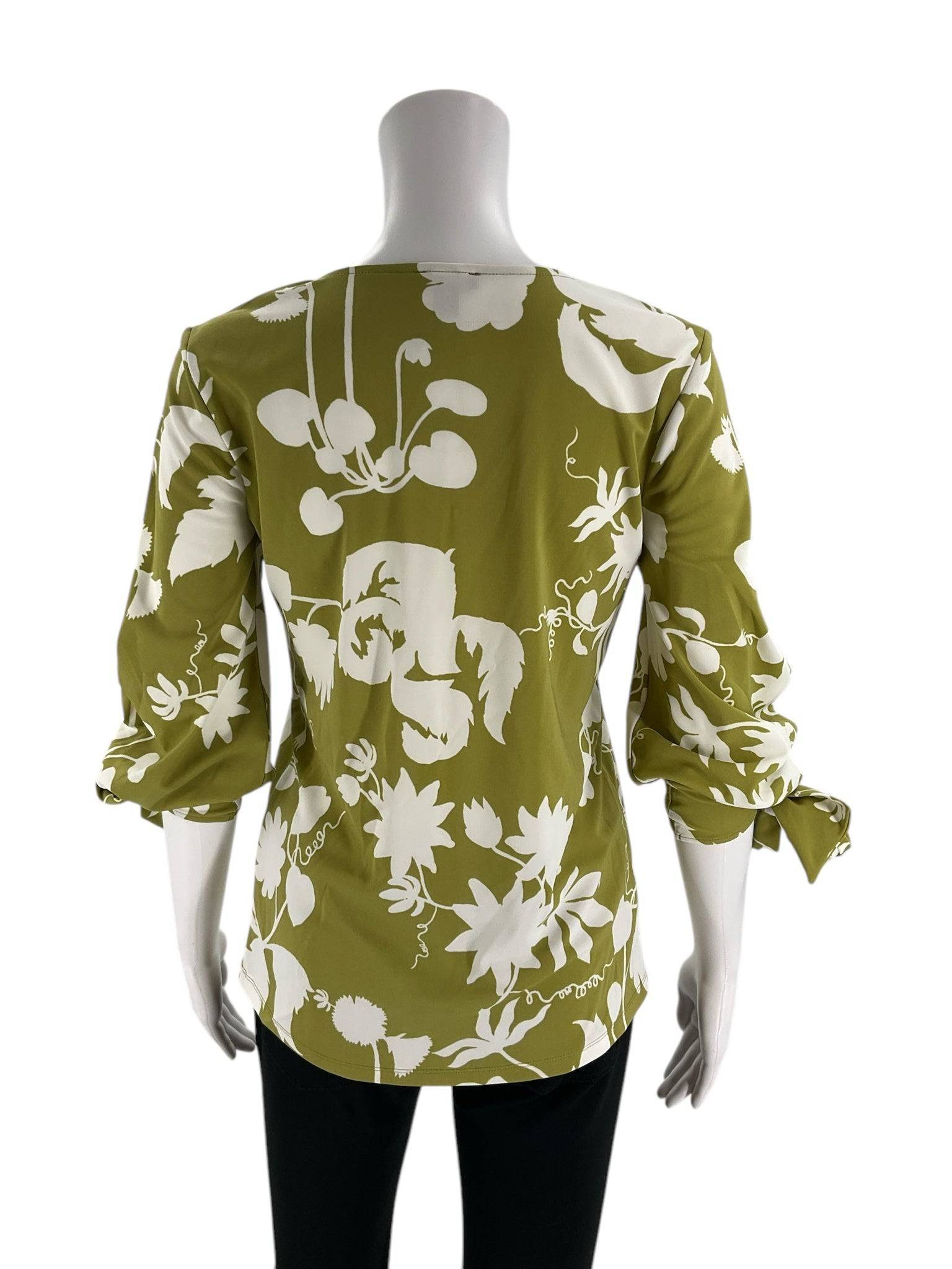 Back view of Ann Taylor Green/White Floral Top Size XS featuring a curved hem and gathered sleeves, from Margaret’s Fine Consignments.