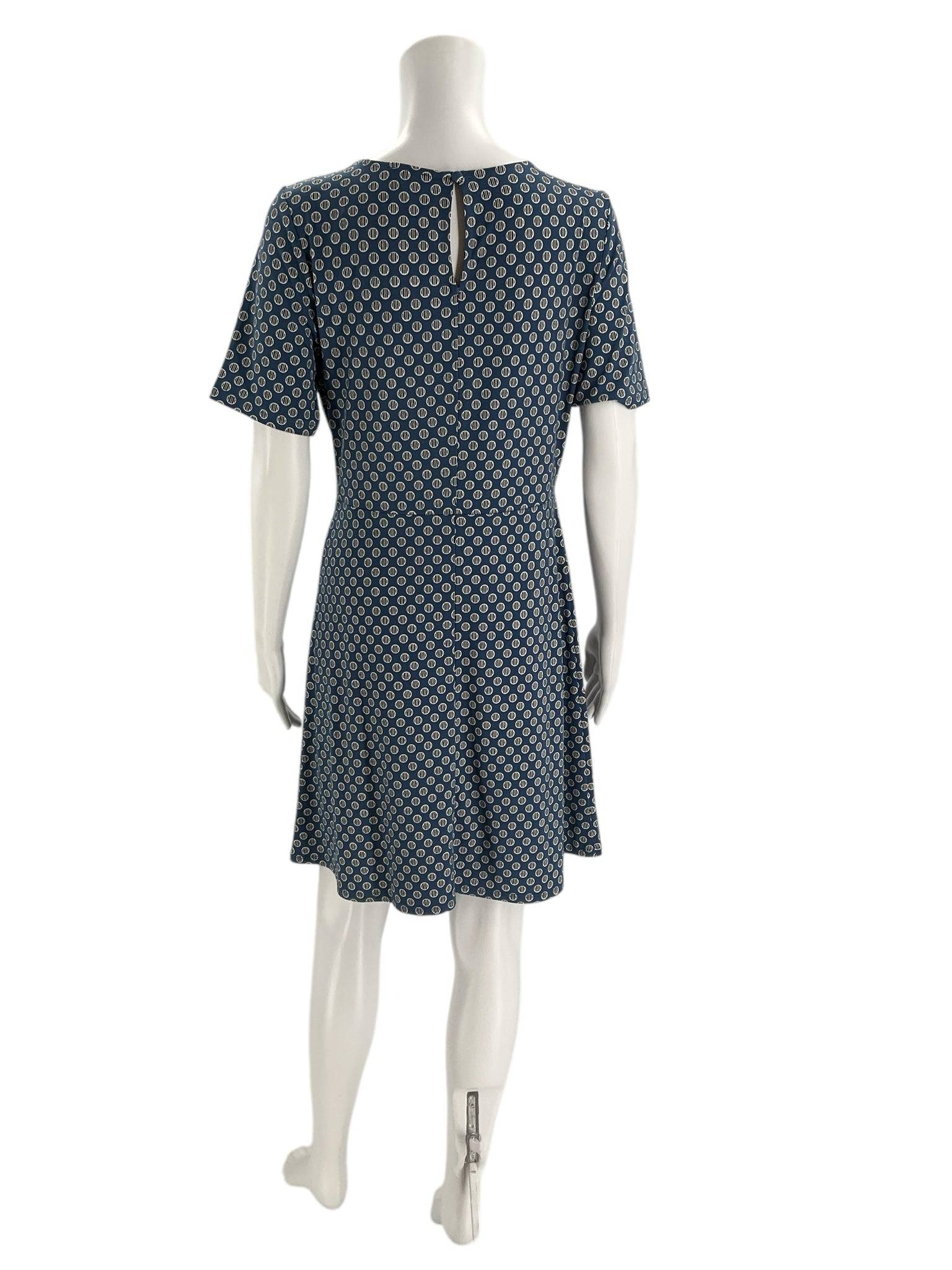 Back view of Ann Taylor Dress Size Medium Petite featuring keyhole detail and fitted silhouette, sold at Margaret’s Fine Consignments.
