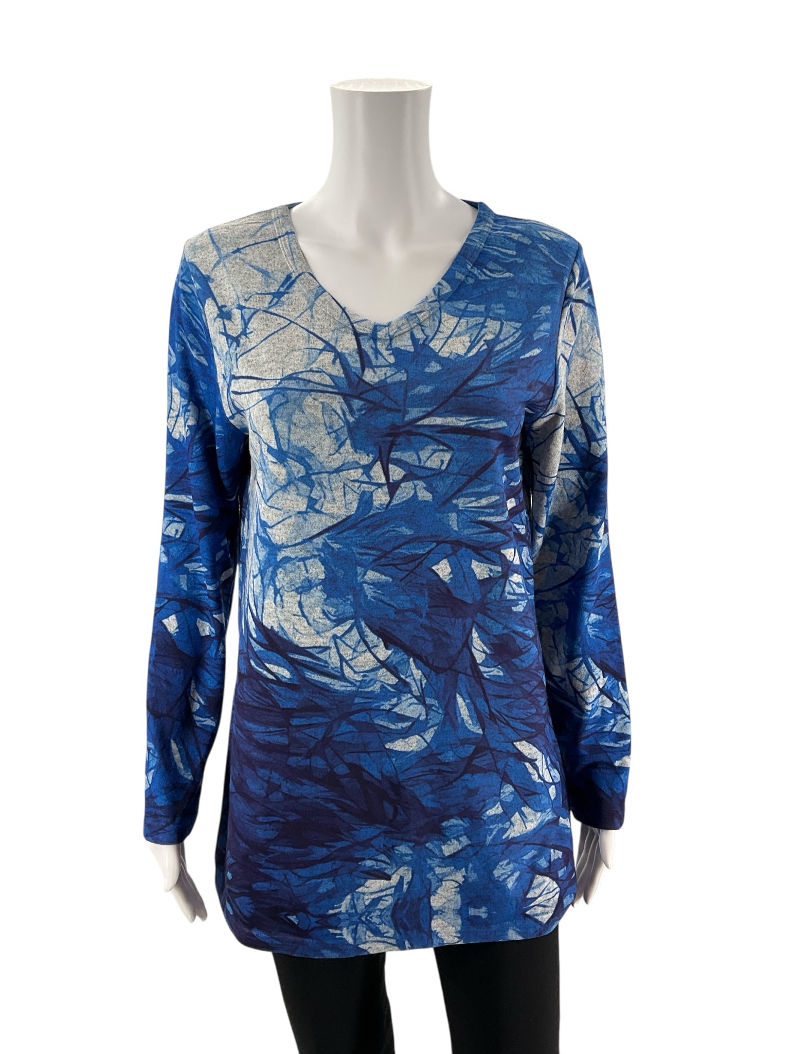 Miss Nikky blue print long sleeve tunic top in size small with a V-neck and casual pullover style.
