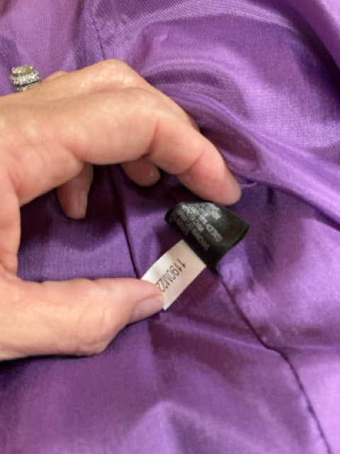 Interior tag of Antonio Melani purple dress displaying style number 1900202, confirming authenticity and product details.