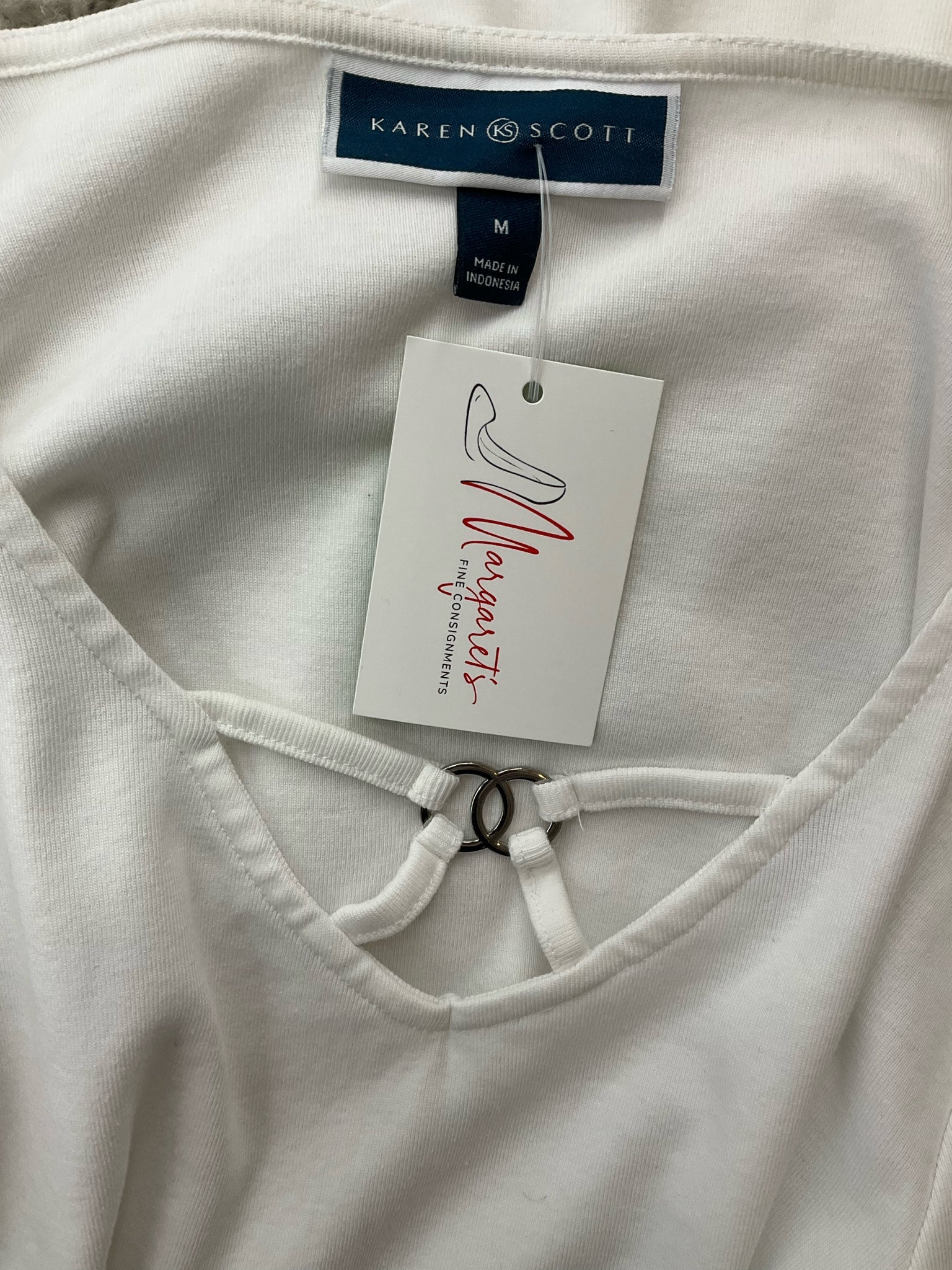 White solid A-line top for women in size medium by Karen Scott, showcasing a minimalist and casual style.