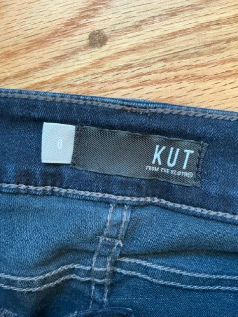 Close-up of Kut Jeans Size 0 waistband label showing brand and size, emphasizing authenticity and fit.