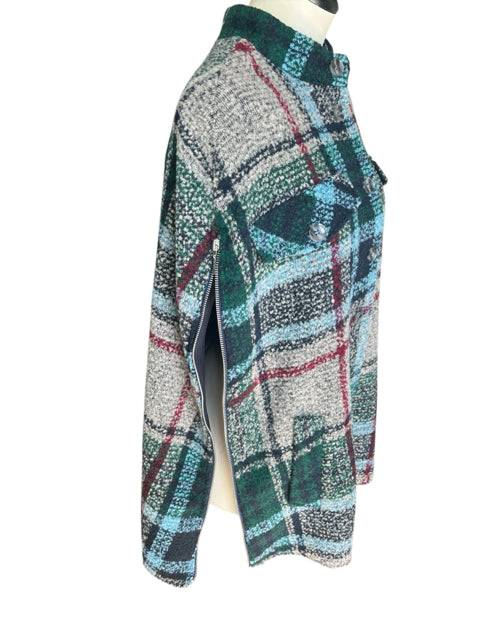 Side view of Andersen & Lauth tan/navy/green plaid poncho featuring open arm slits and button-up front, one size fits most, cozy outerwear option.