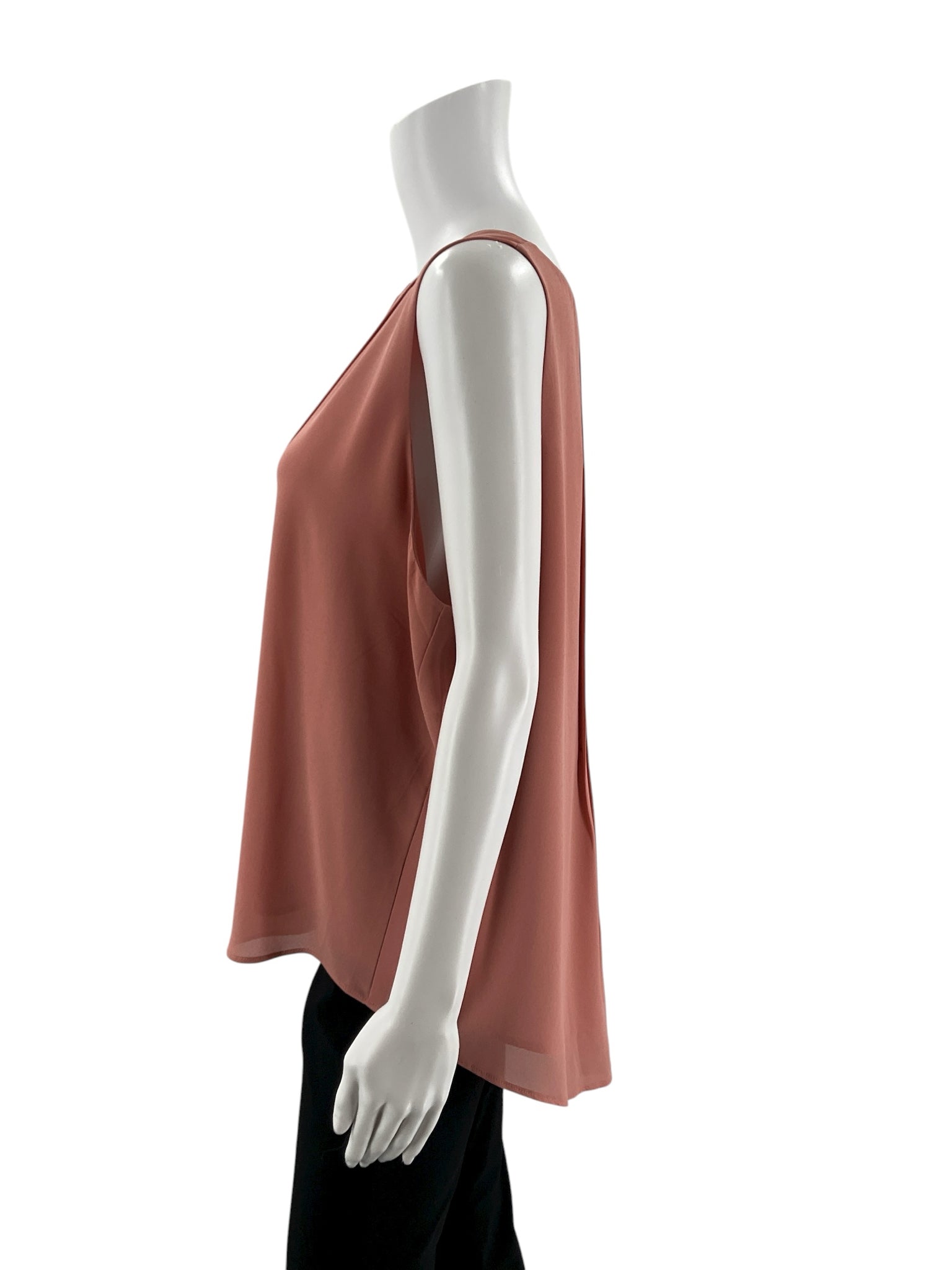 Salmon sleeveless blouse by Ann Taylor, size XL, featuring a swing top design and high-low hem.