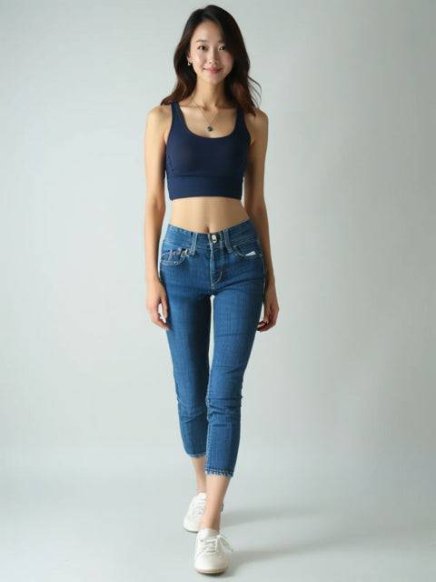The Proportion Of Blu Capri Pants Size 6 styled on model, featuring mid-rise waist and cropped denim fit for casual warm-weather outfits.