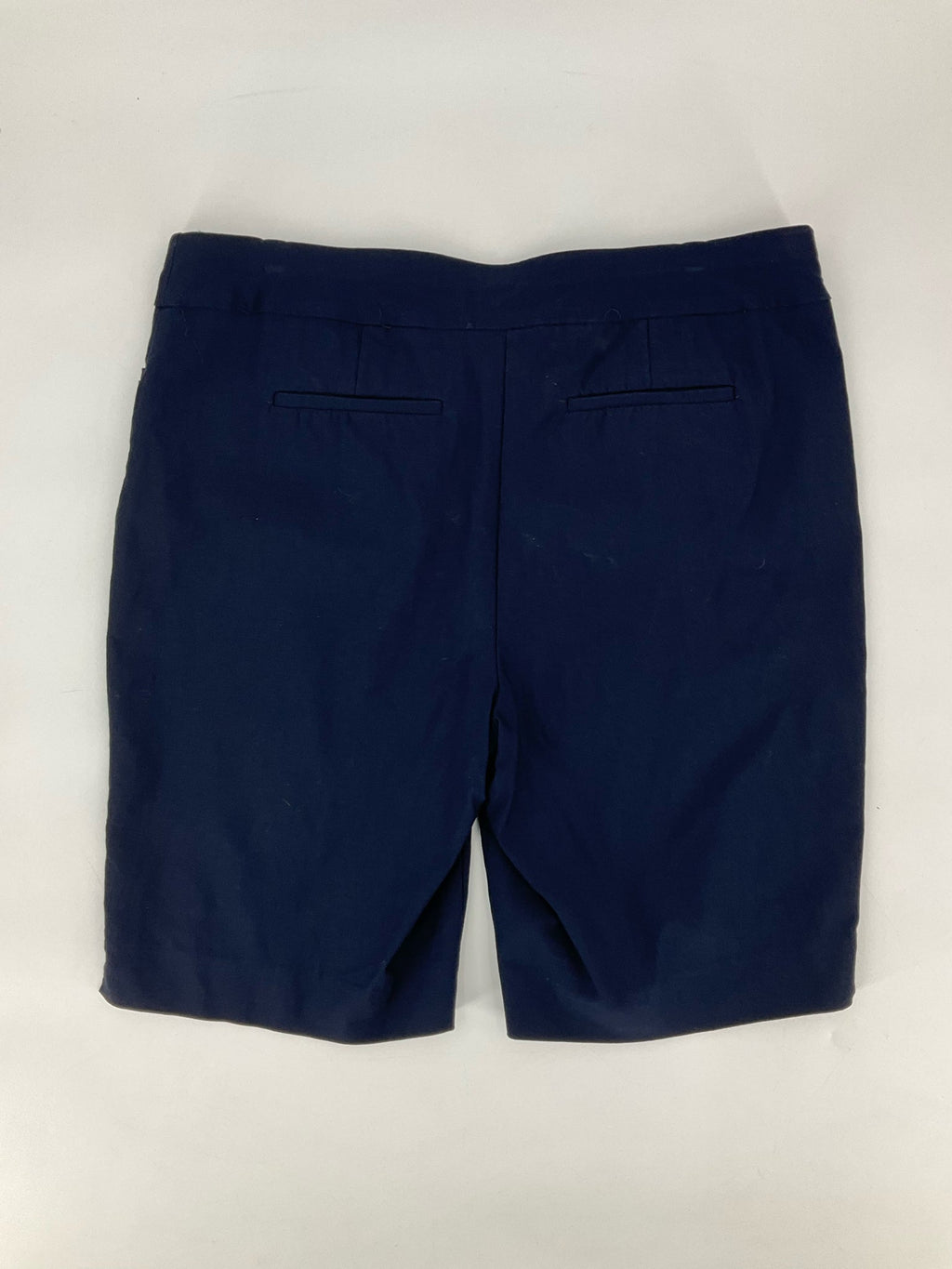 Chico's navy solid Bermuda shorts, size 12, flat front, pull-on style, featuring a comfortable stretch fabric.
