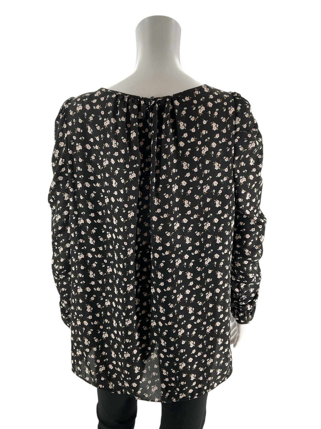 Max Studio white and black floral peasant top in size large, featuring a boho tunic design with romantic details.