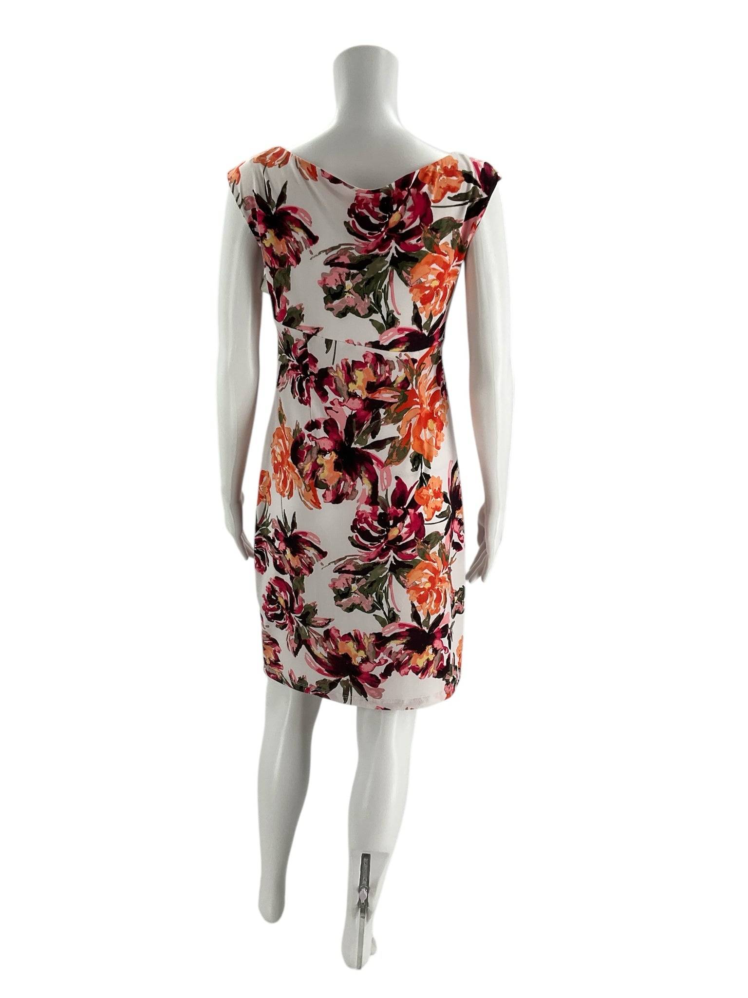 Back view of Connected Dress Size 6 Petite featuring a colorful floral design, perfect for casual spring or summer outfits at Margaret’s Fine Consignments.