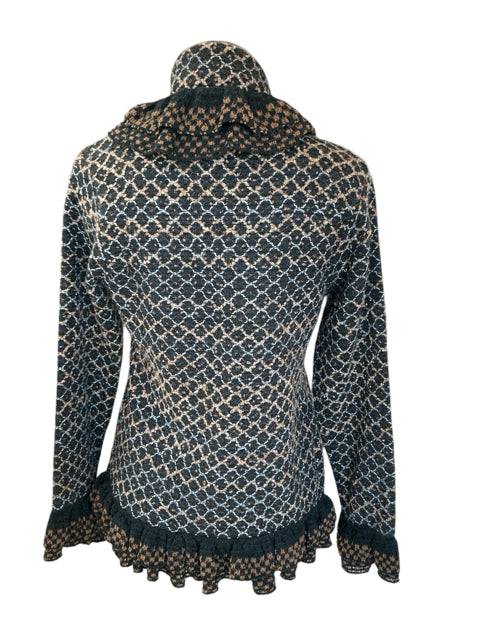 Back view of Yvos Shrug Size Small in brown and black pattern with ruffle hem, perfect for stylish layering from Margaret’s Fine Consignments.