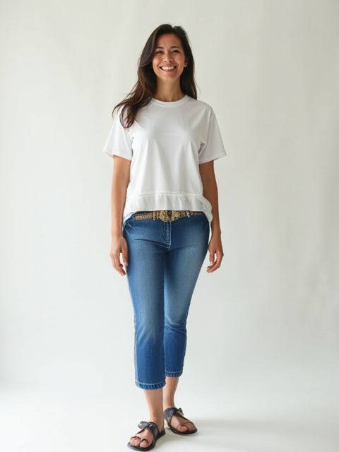 Model wearing PINKO Capri Jeans Size 6 from Margaret's Fine Consignments, showcasing a slim fit and cropped denim style for casual chic looks.