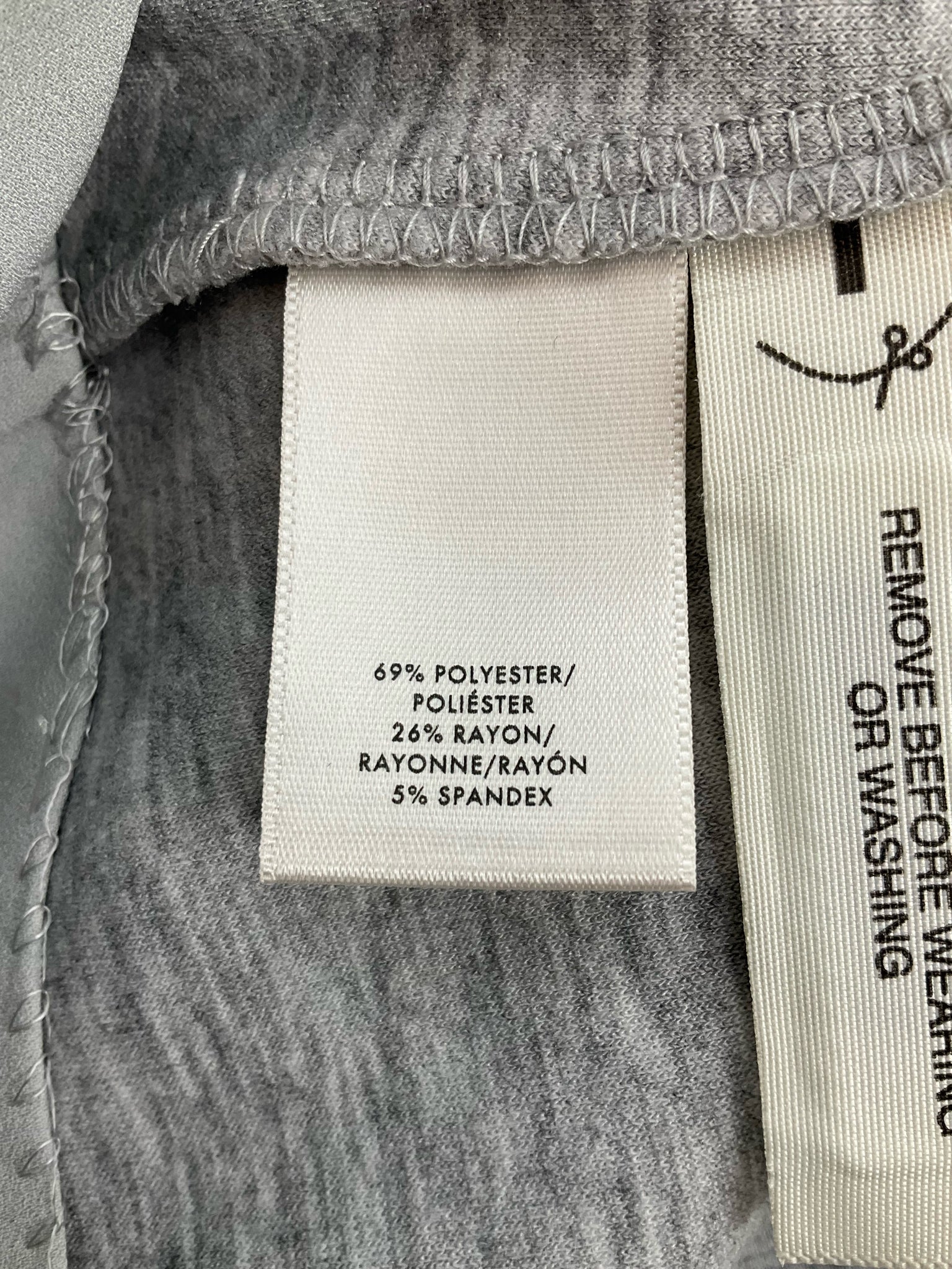 Ann Taylor gray heathered peplum top with V-neck, suitable for business casual, size small.