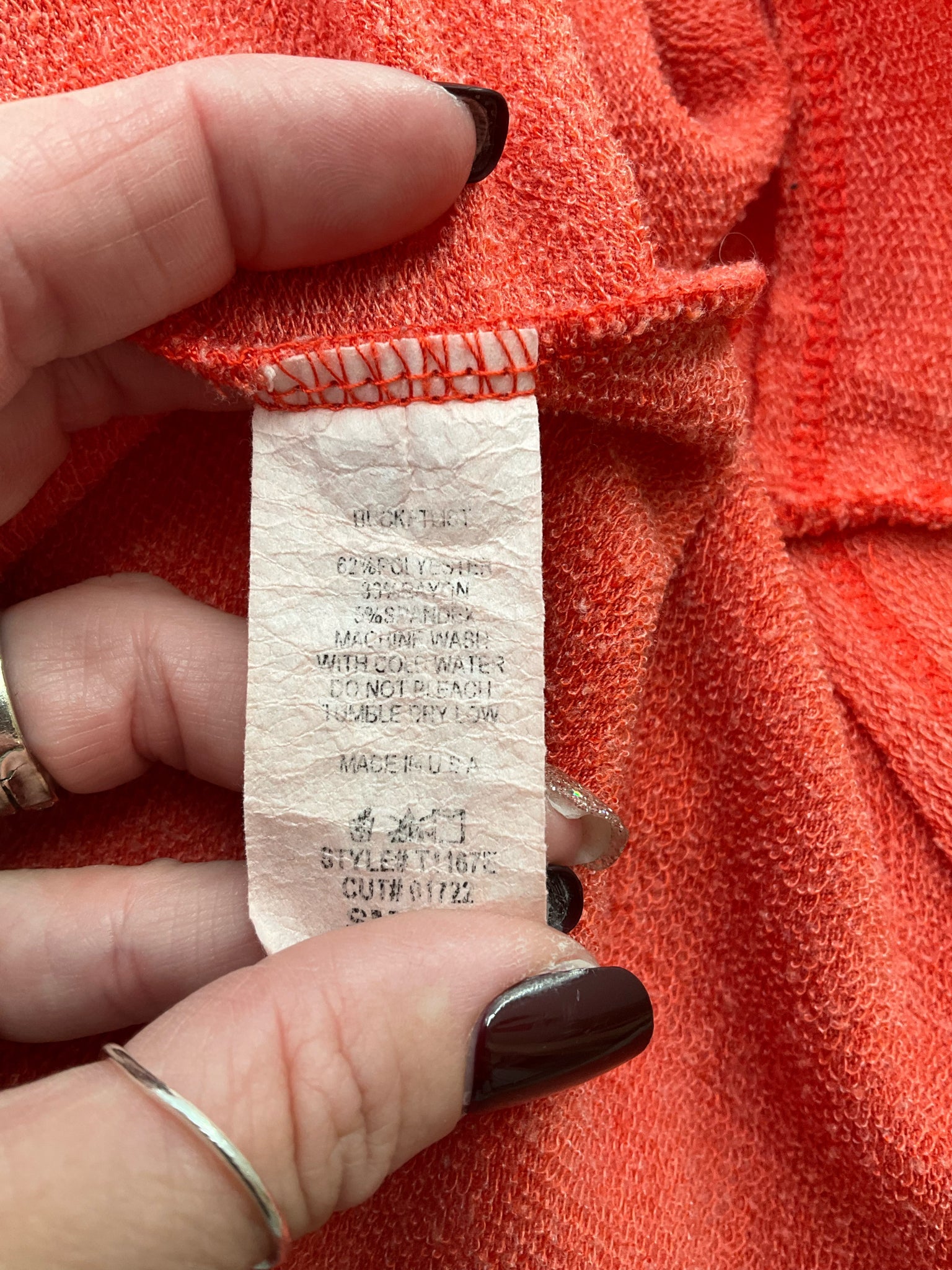 Orange solid pre-owned ladies' tunic top by Bucket List, size small, featuring a relaxed fit and casual pullover style.