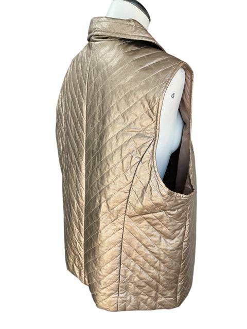 Side view of Chico's gold quilted vest Size XL on mannequin, highlighting sleeveless cut and textured stitching detail.