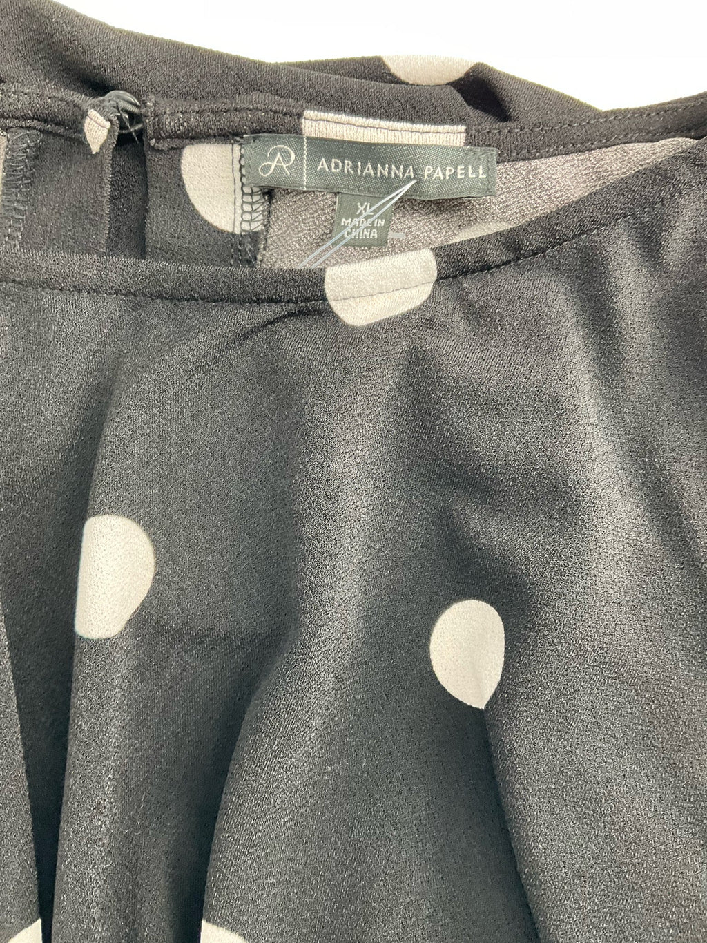 Black and white polka dot casual top by Adrianna Papell, size XL, featuring a relaxed fit and stylish design.