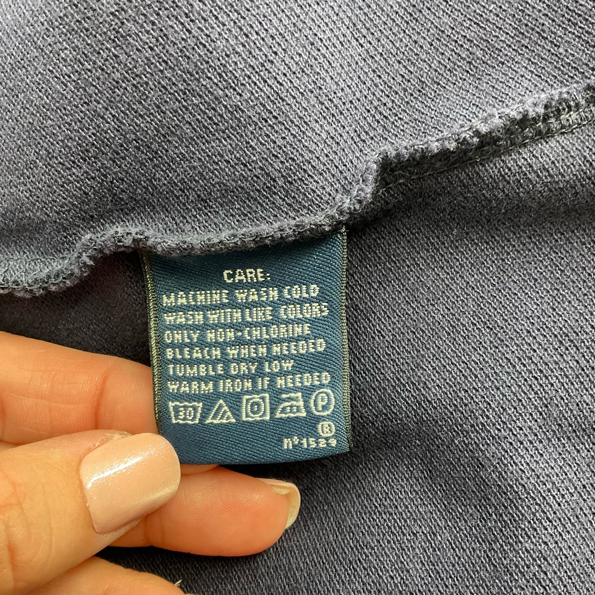 Care label of Ralph Lauren Sport Navy Pre-Owned Dress - Size XL with washing and drying instructions for cotton fabric.