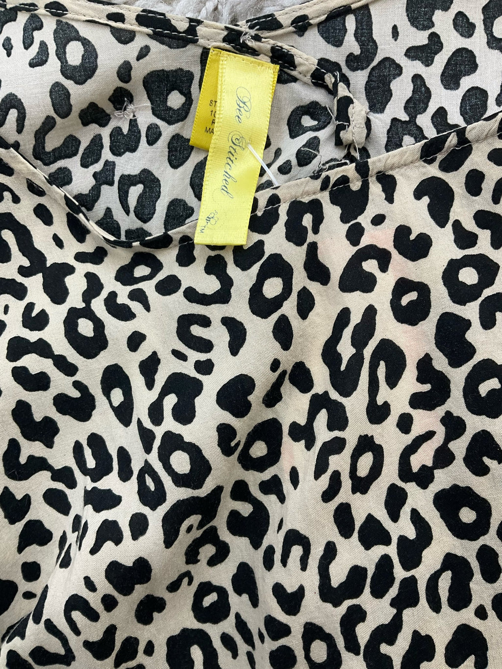 Tan and black animal print blouse by Bee Stitched, pre-owned, size small, featuring a casual tunic style.