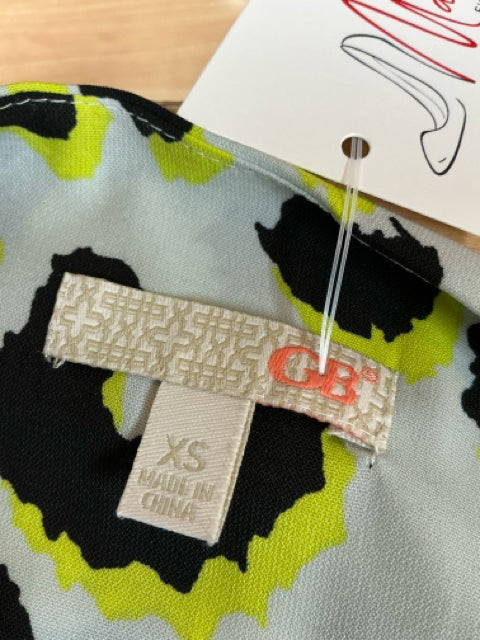 Brand and size label of GB Aqua/Yellow/Black Animal Pre-Owned Ladies Dress - Size XS with GB logo and made in China tag.