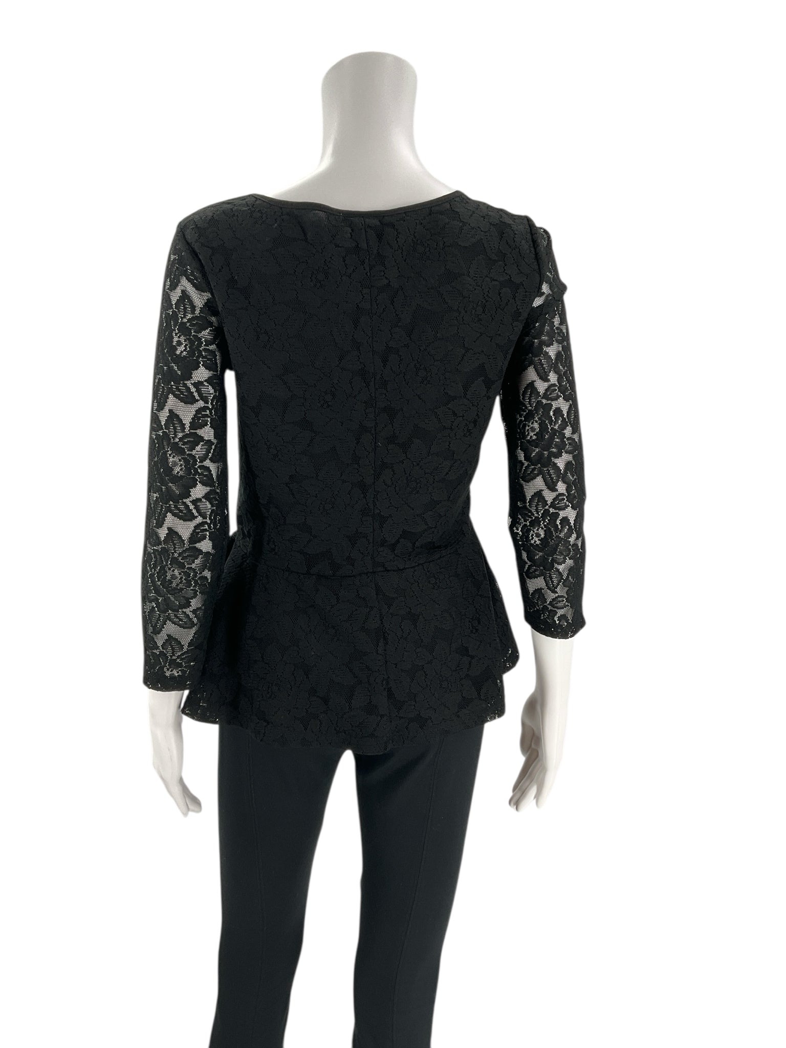 Back view of Loft Black Lace Pre-Owned Top - Size Small showing full lace sleeves and fitted back seam for a tailored look.