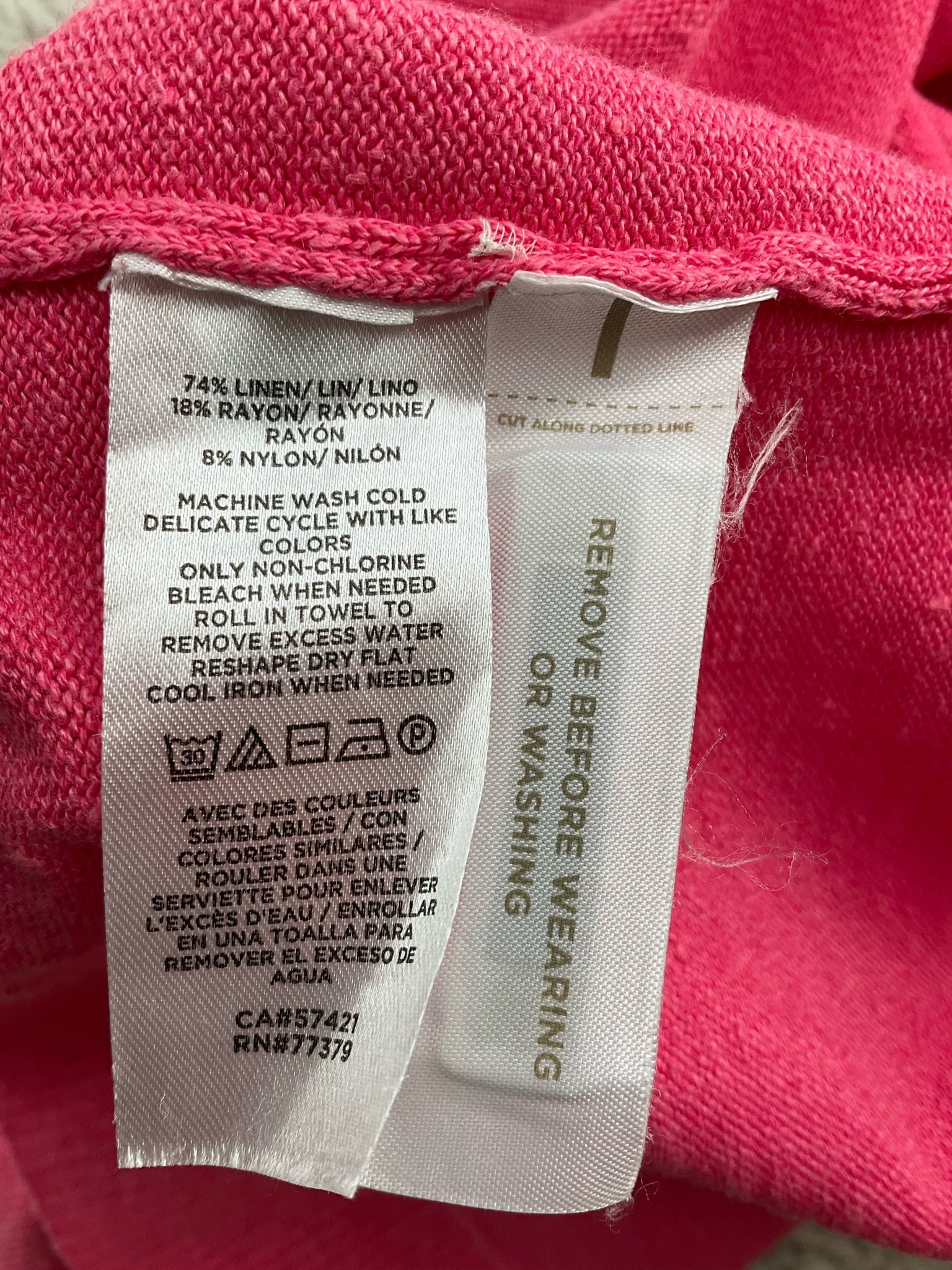 Ann Taylor pink solid knit pullover top in size large with bateau neck and relaxed fit, perfect for casual wear.