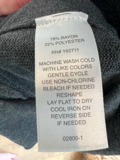 Care label of Liz Claiborne Top Size Large showing fabric blend of 78% rayon and 22% polyester with washing instructions. Available at Margaret's Fine Consignments.