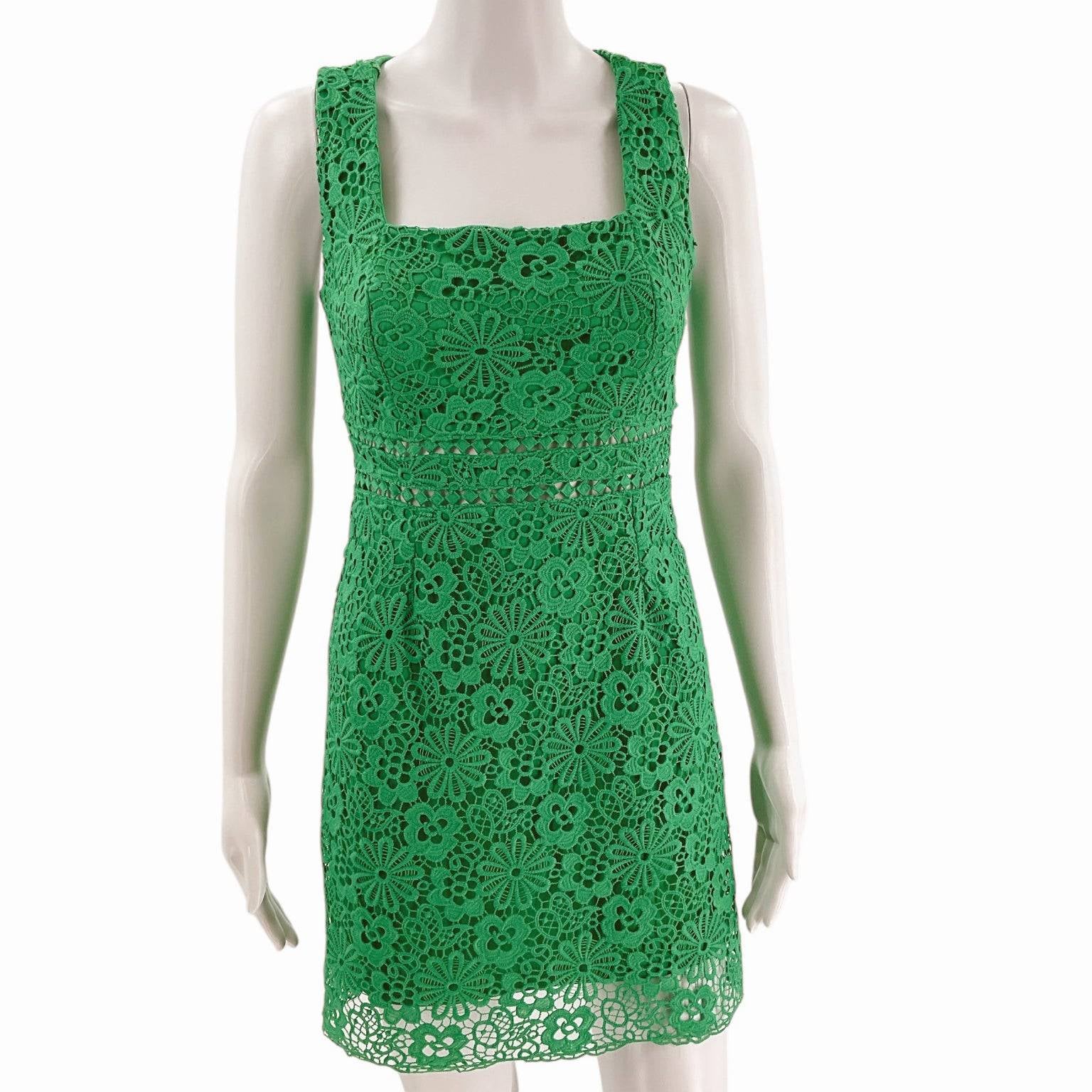 Front view of She + Sky Size Small green crochet dress on mannequin, featuring floral lace detail and square neckline at Margaret's Fine Consignments.