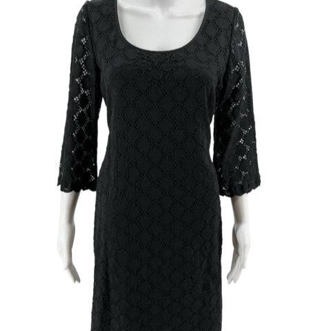 Front view of Ronni Nicole Black Eyelet Dress Size 12 featuring scalloped hem and sleeves, sold by Margaret’s Fine Consignments.