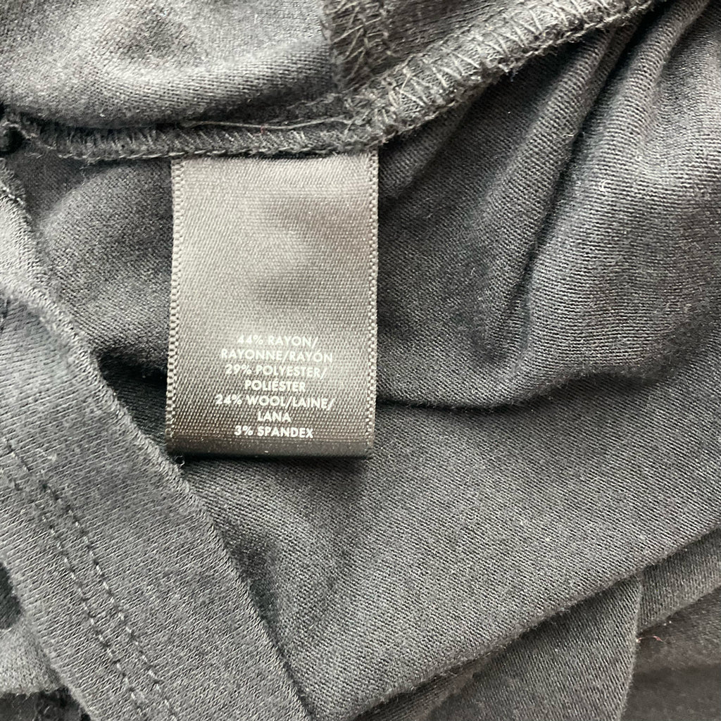 Fabric content tag of Ann Taylor Black Solid Pre-Owned Top - Size Small, showing rayon, polyester, wool, and spandex blend.