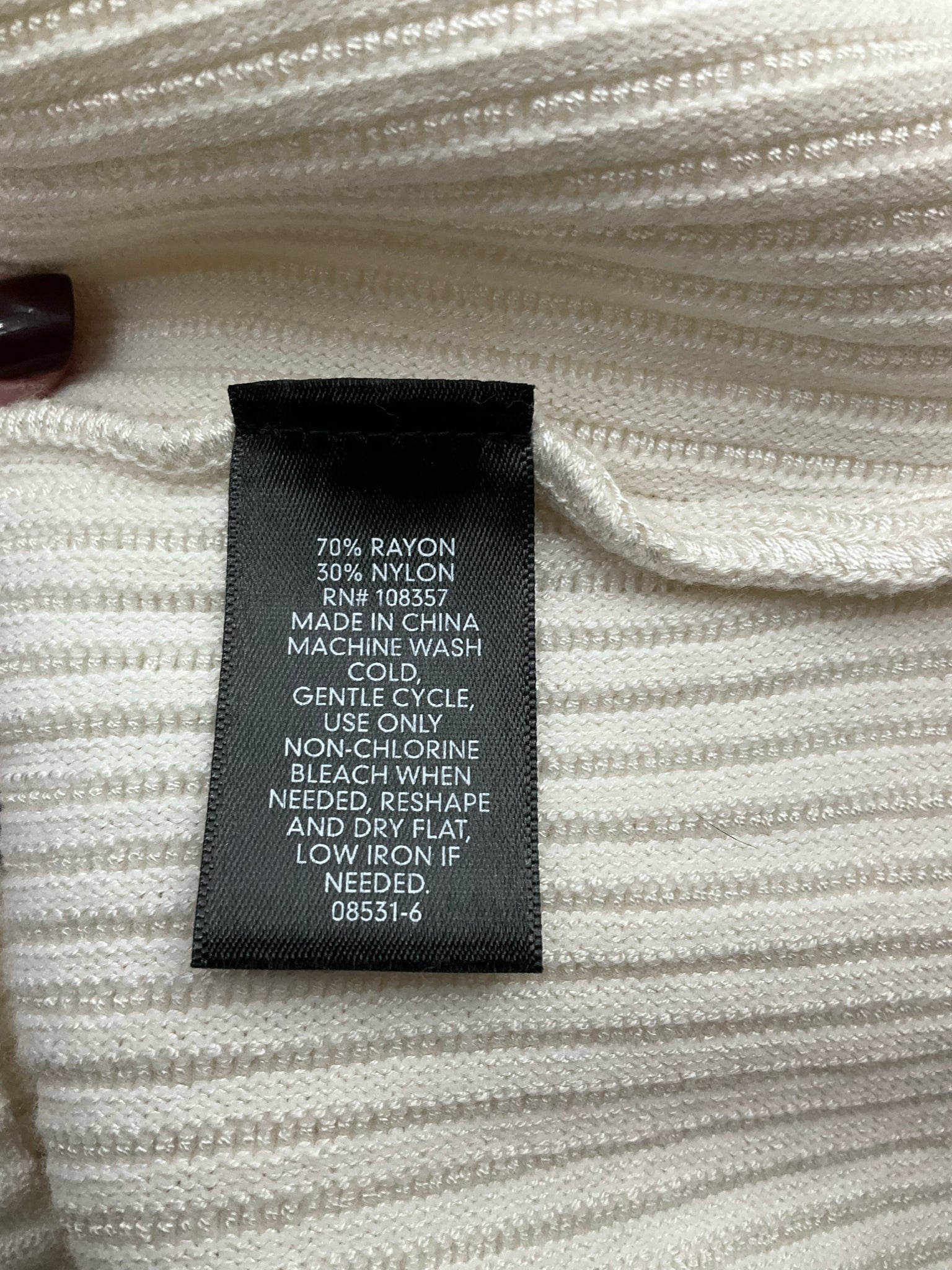 Cream ribbed mock neck sleeveless sweater tank top by Worthington in size large, perfect for business casual outfits.