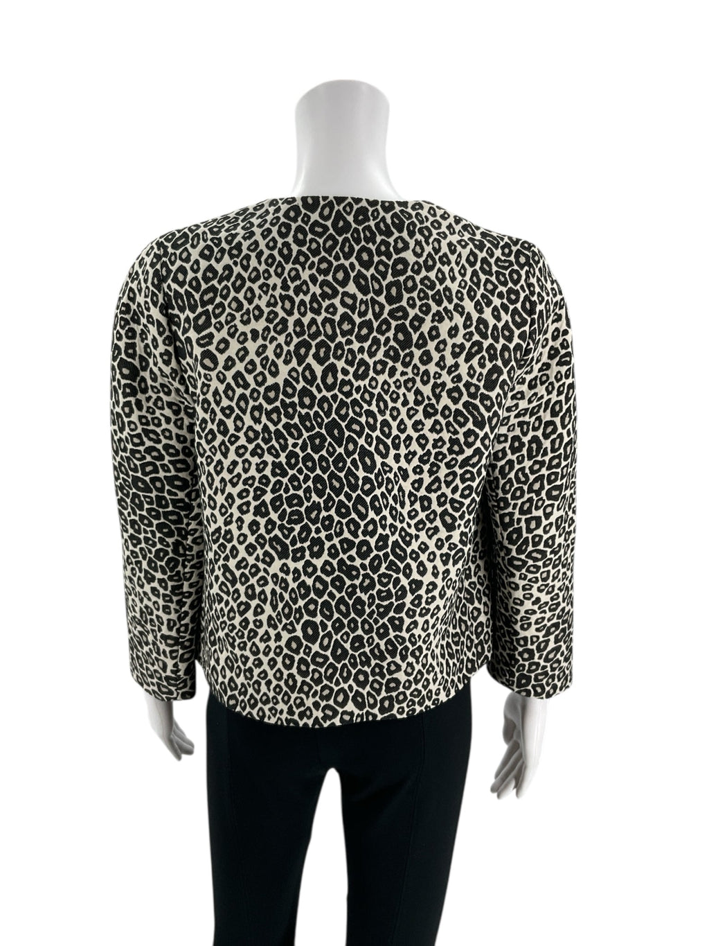 Back view of Ann Taylor Cream/Black Animal Pre-Owned Jacket - Size XS, highlighting the full animal print pattern and cropped silhouette.