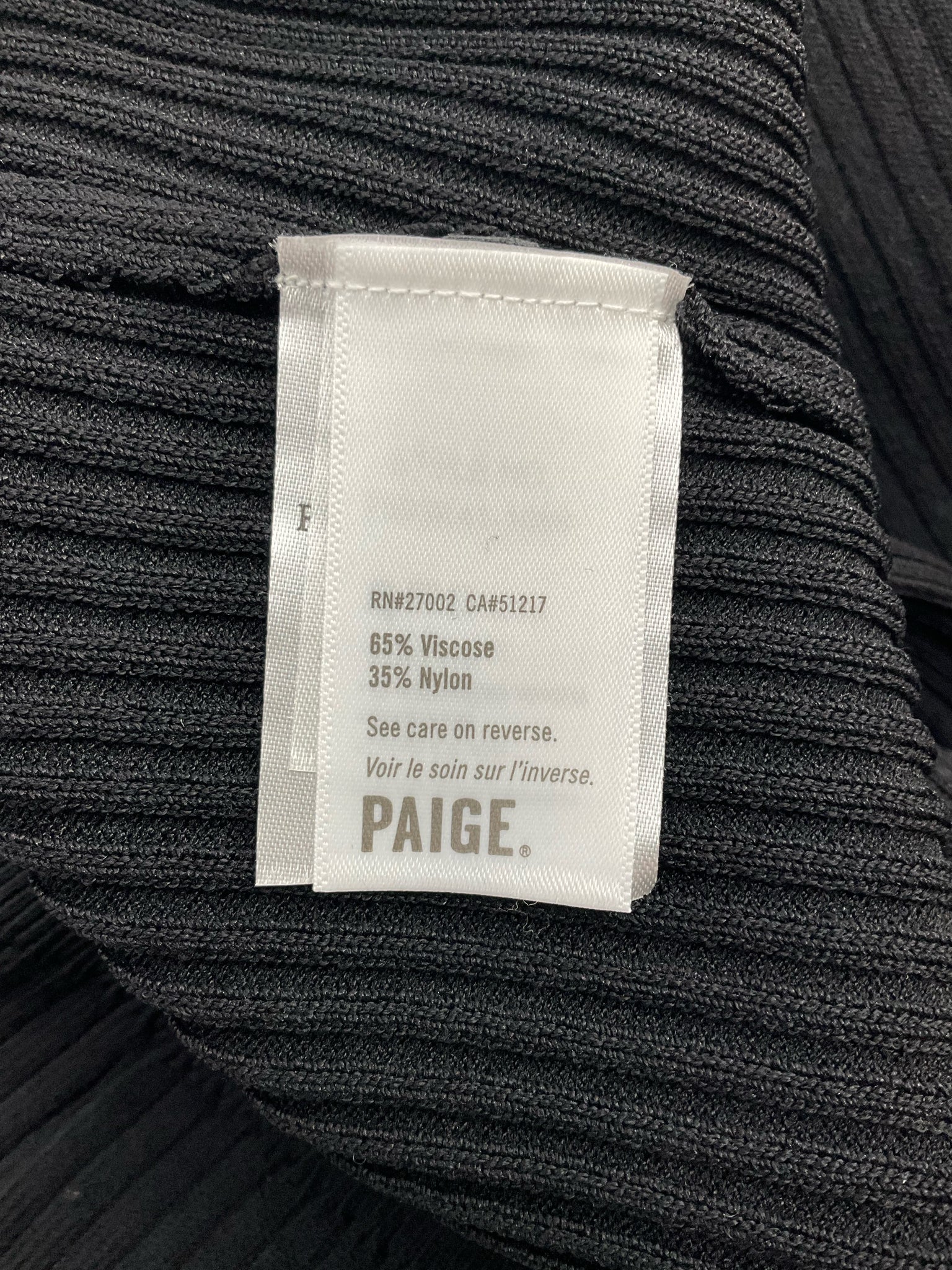 Paige black ribbed knit top with square neck, balloon sleeves, and pullover design, size large, new with tags.