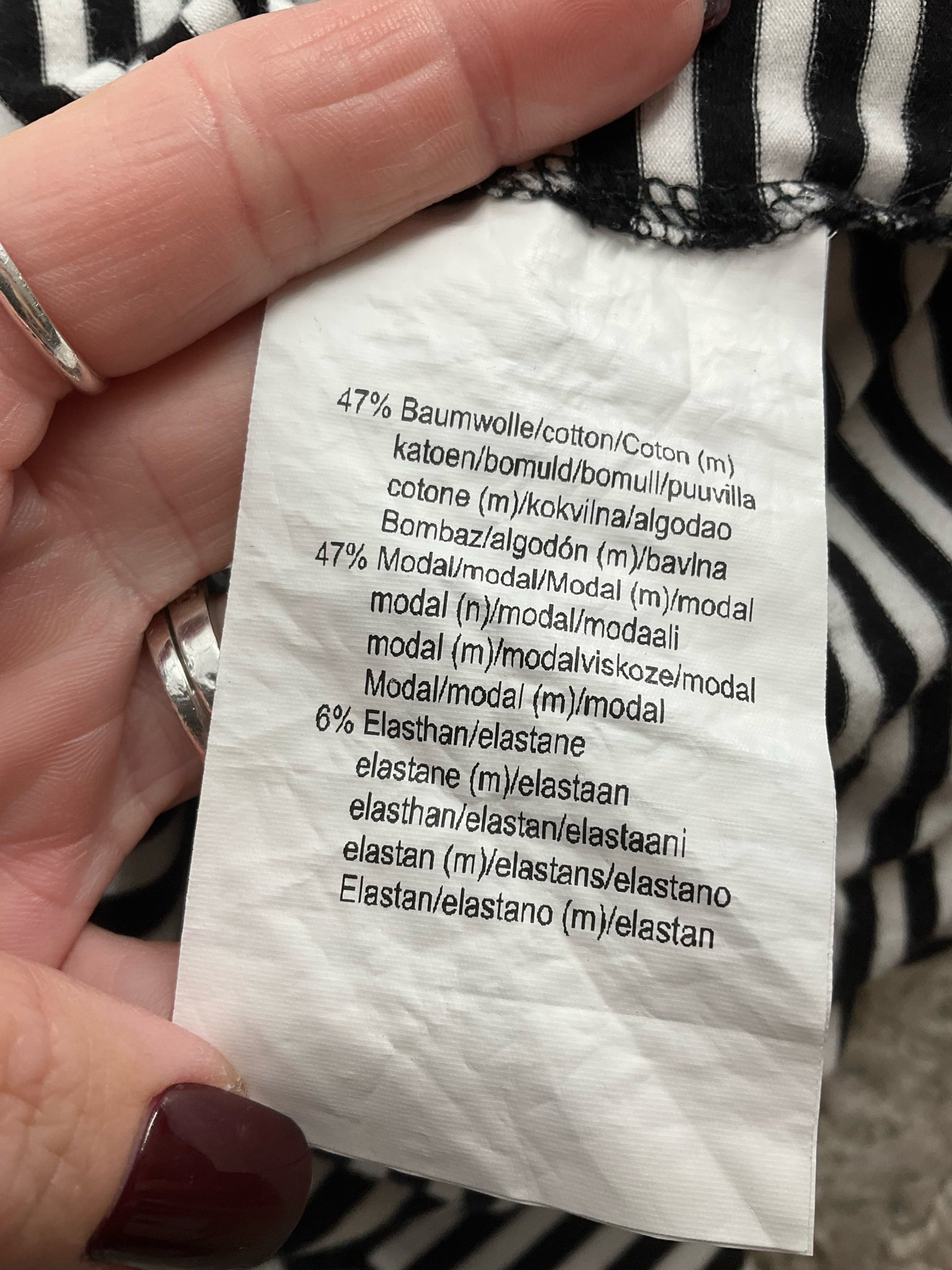 Basler pre-owned ladies top in white and black stripes, size large, showcasing a classic casual design.