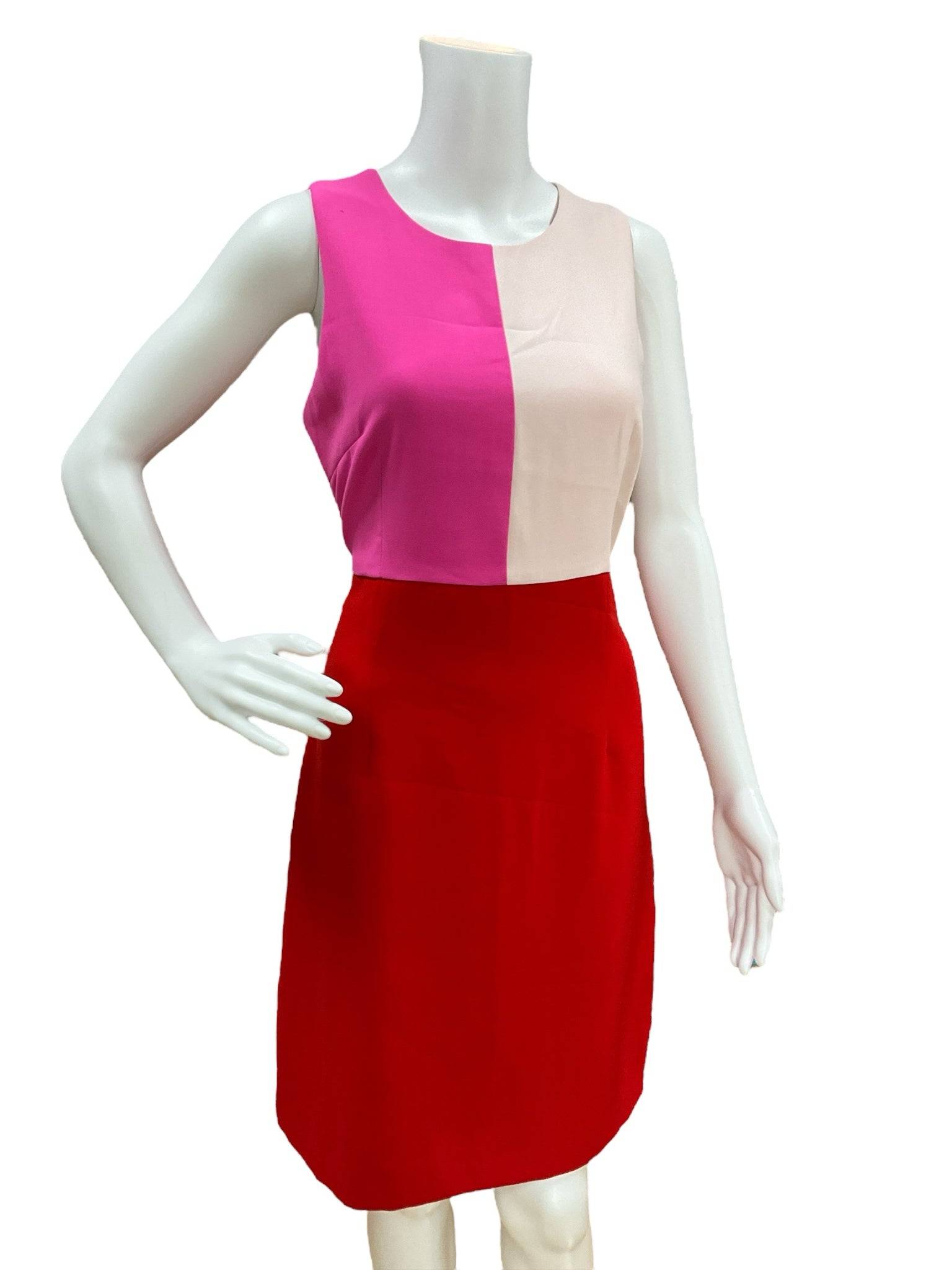 Julie Brown Dress Size 6 pink, white, and red sleeveless color block cocktail dress shown on mannequin with side hand pose.