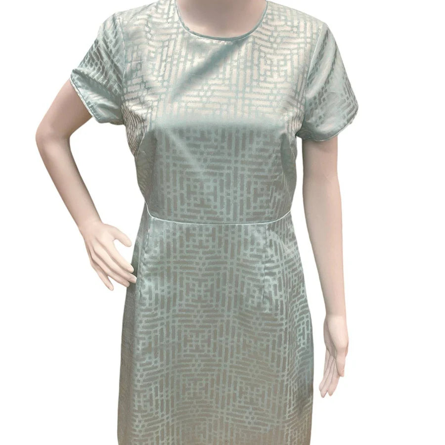 Aqua print pe-owned ladies dress by Julie Brown, size 4, featuring a vibrant design and flattering fit.