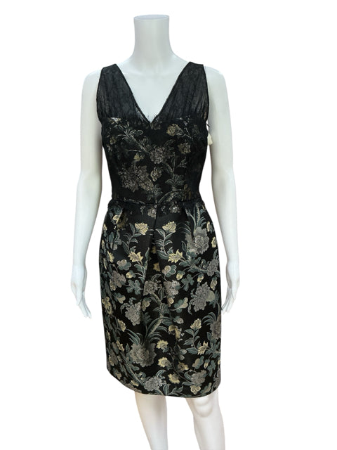 Pre-owned Kay Unger black and gold floral sheath dress on mannequin, showcasing intricate brocade pattern and formal cocktail style.
