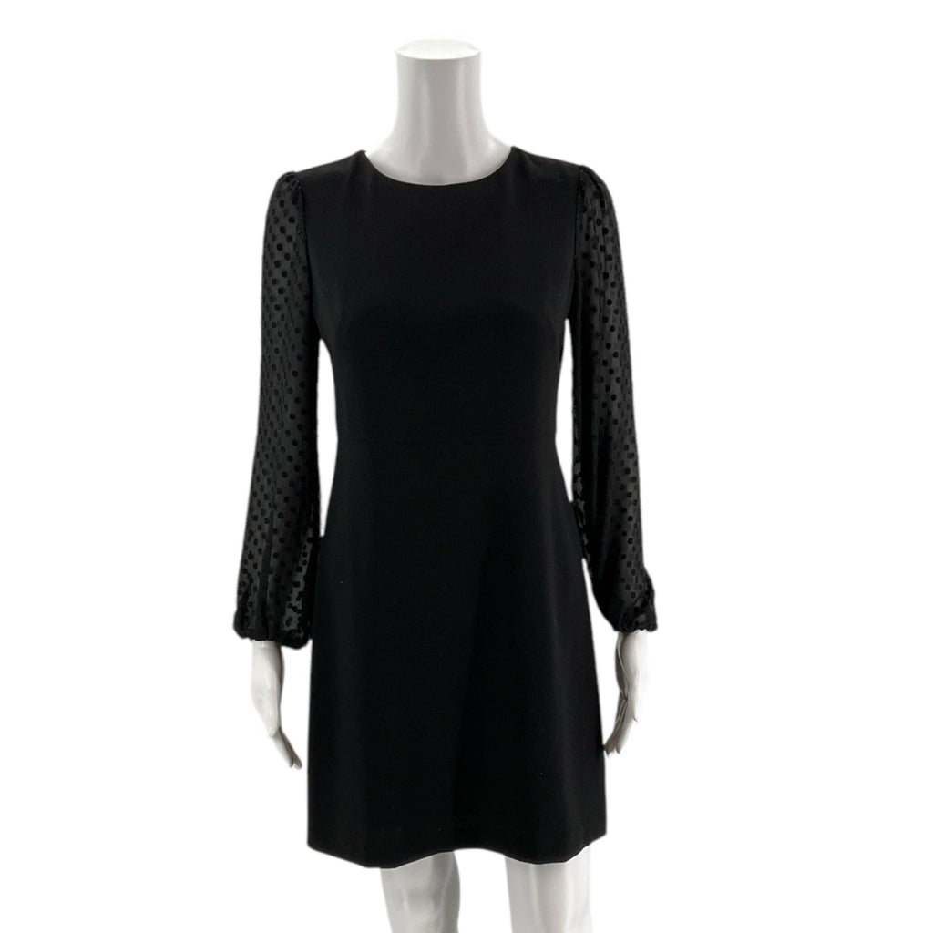 Front view of Ann Taylor Long Sleeve Black Solid Dress Size 0 Petite on mannequin, chic and timeless at Margaret's Fine Consignments.