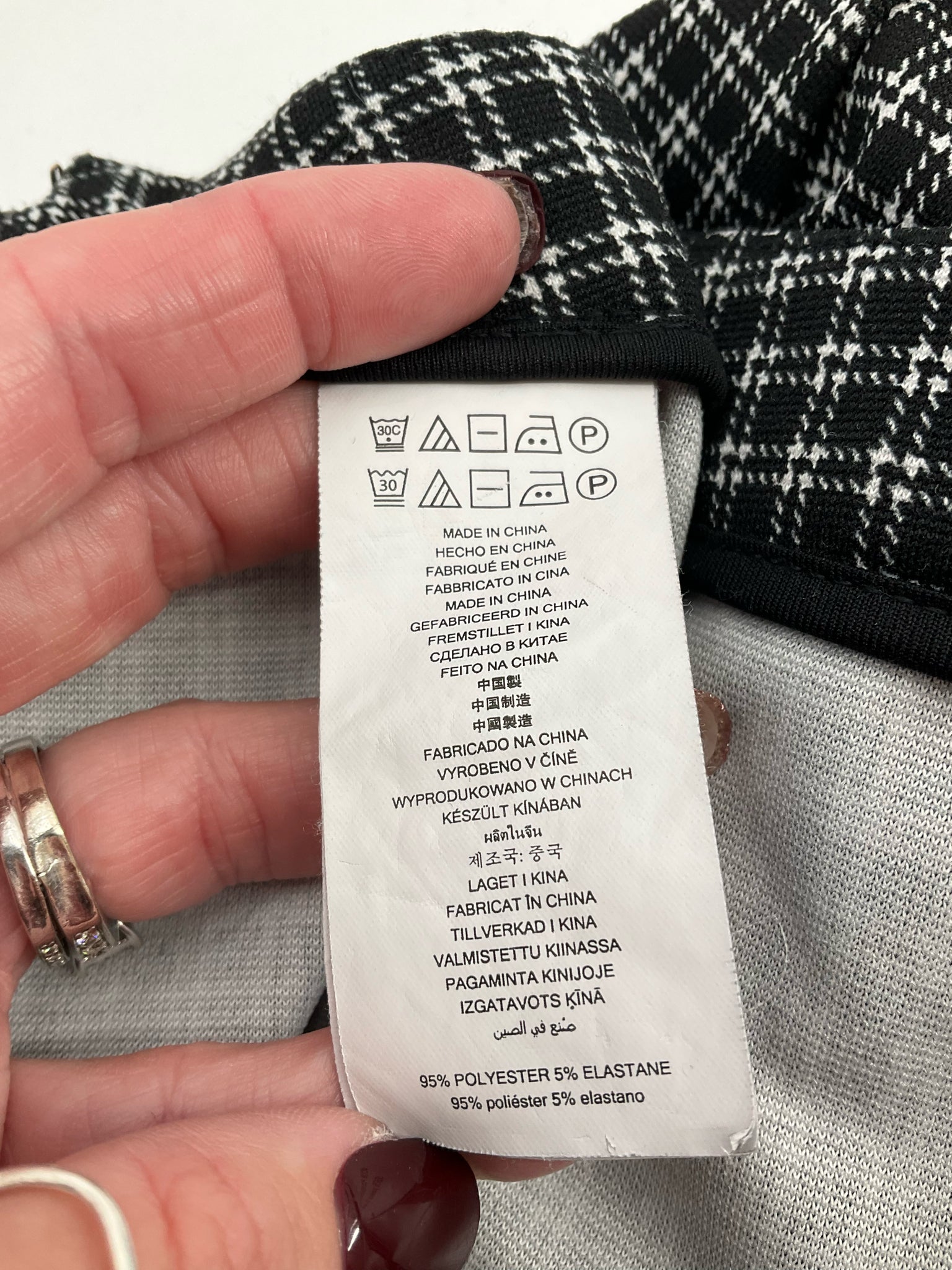 Black and white plaid pull-on ankle trousers for women by MICHAEL Michael Kors, size medium, featuring a slim fit design.