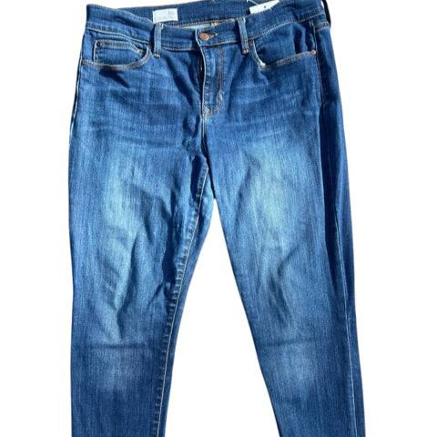 Flat lay of Gap Blue Jeans Size 8, pre-owned denim with classic wash, available at Margaret's Fine Consignments.