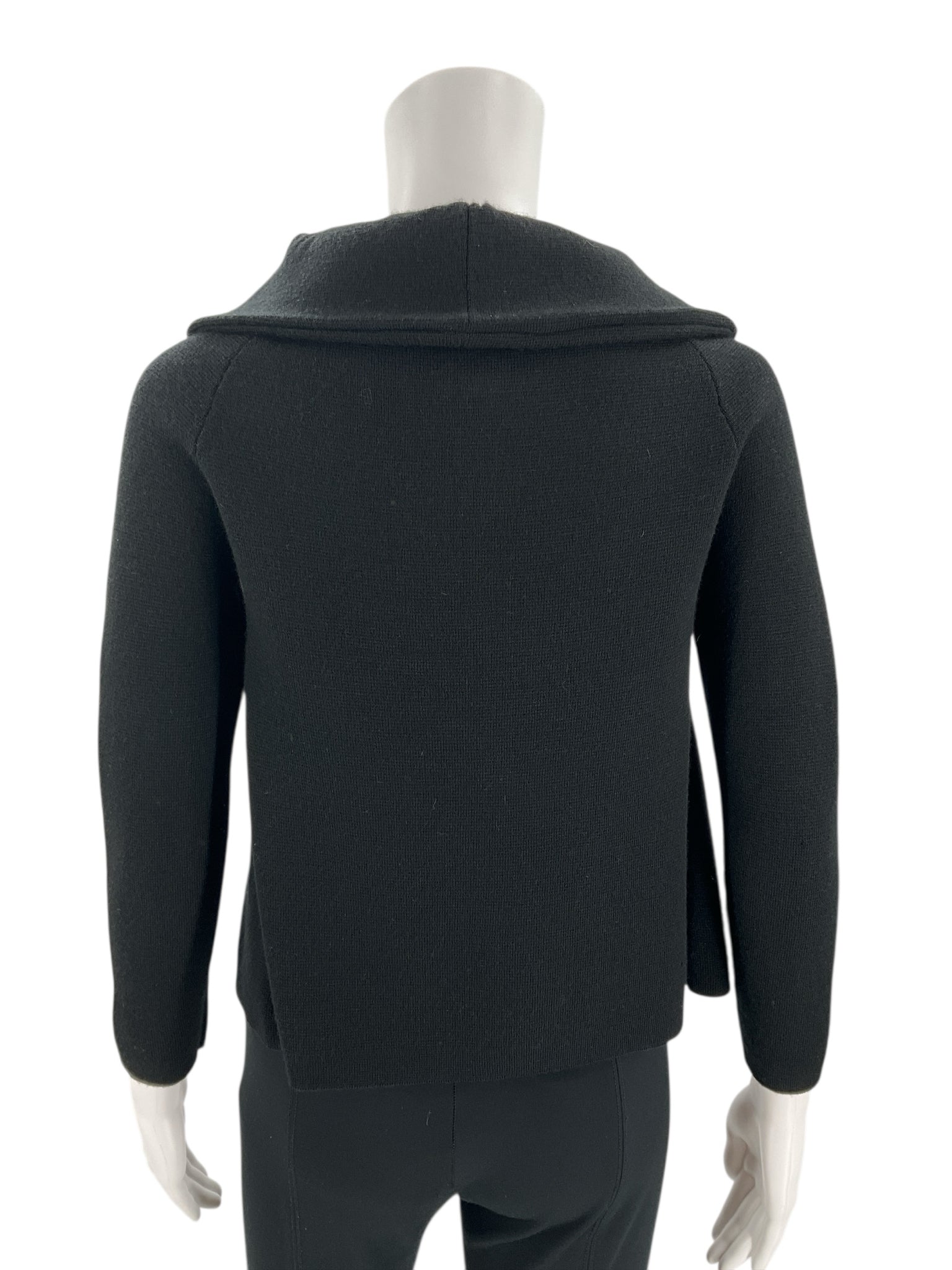 Back view of J Crew Black Solid Pre-Owned Top - Size XS showing clean lines and soft wool texture, perfect for layering.