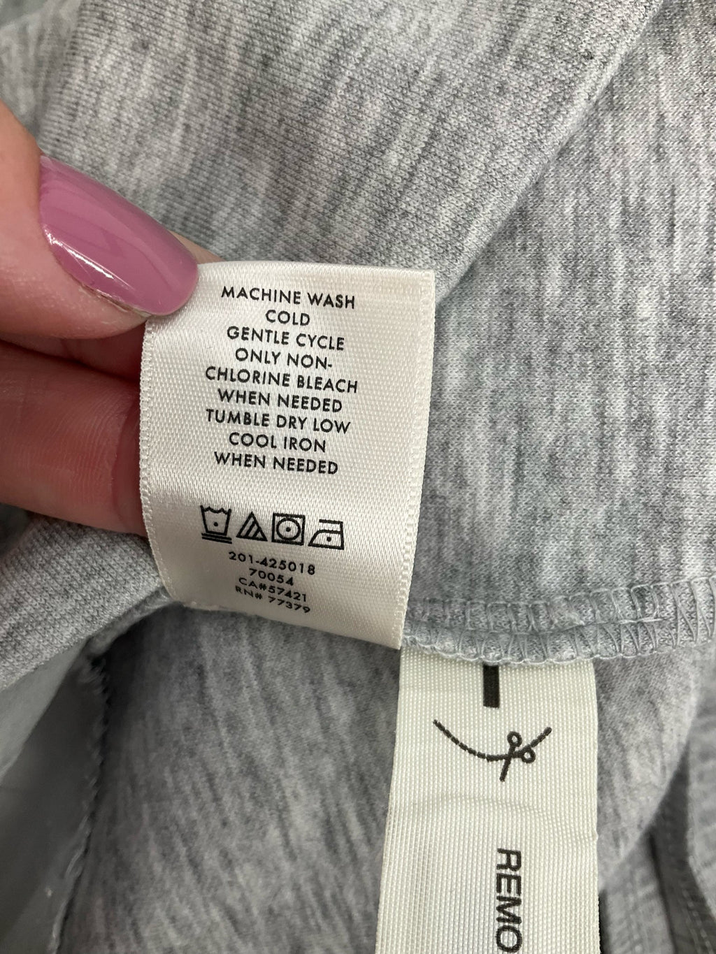 Ann Taylor gray heathered peplum top with a V-neck, size small, ideal for business casual attire.