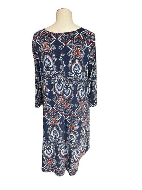 Back view of Karen Kane Dress Size Medium featuring bold navy, cream, and orange print, available at Margaret's Fine Consignments.